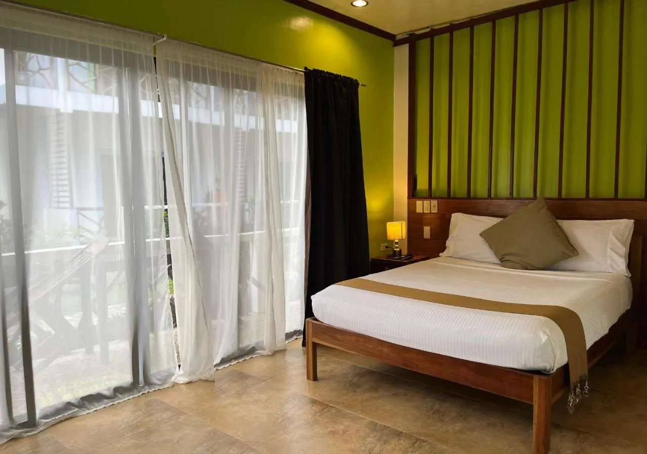 Bed in Hotel Oasis Port Barton