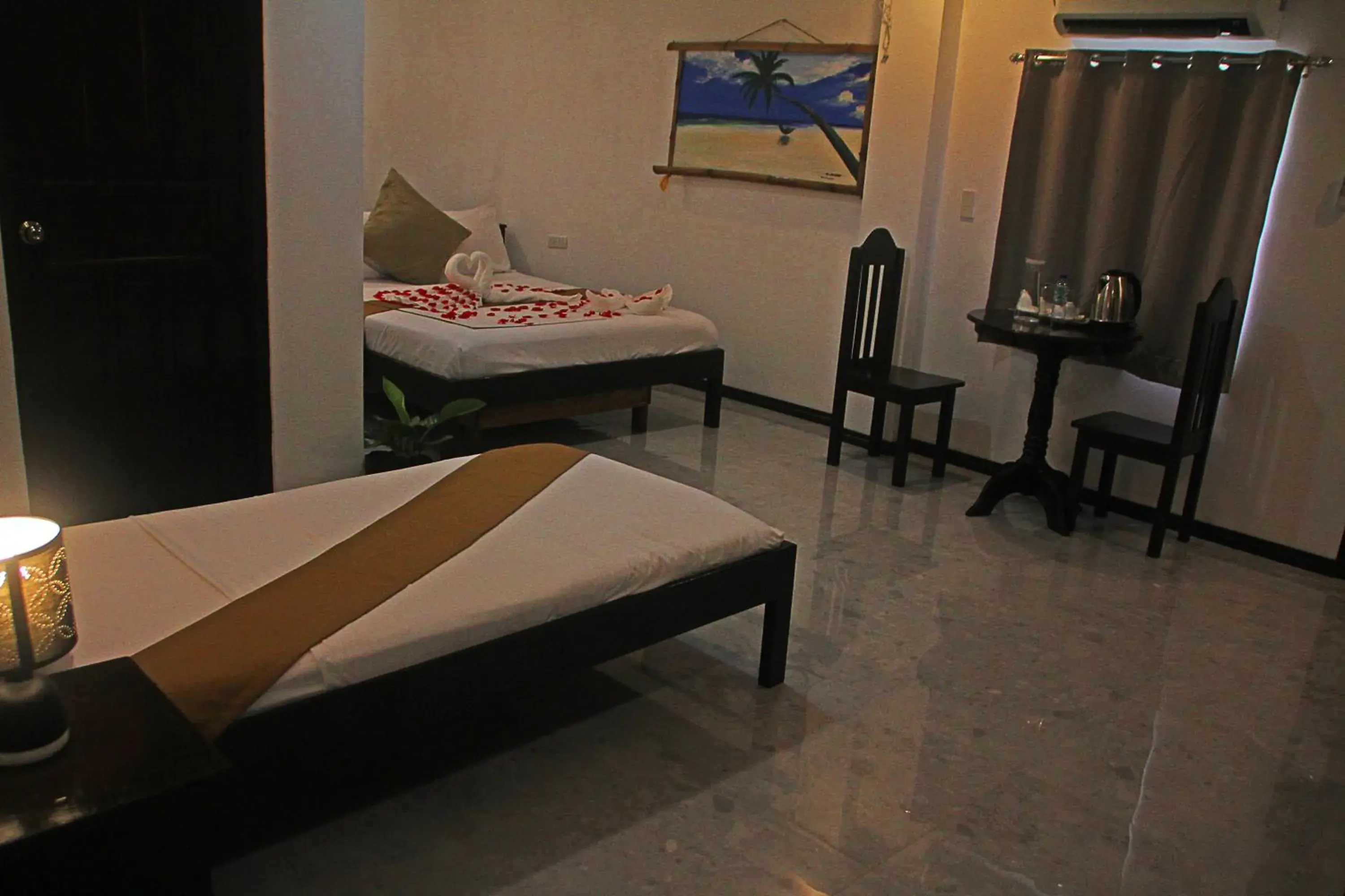 Double Room with Extra Bed in Hotel Oasis Port Barton Double Room with Extra Bed in Hotel Oasis Port Barton