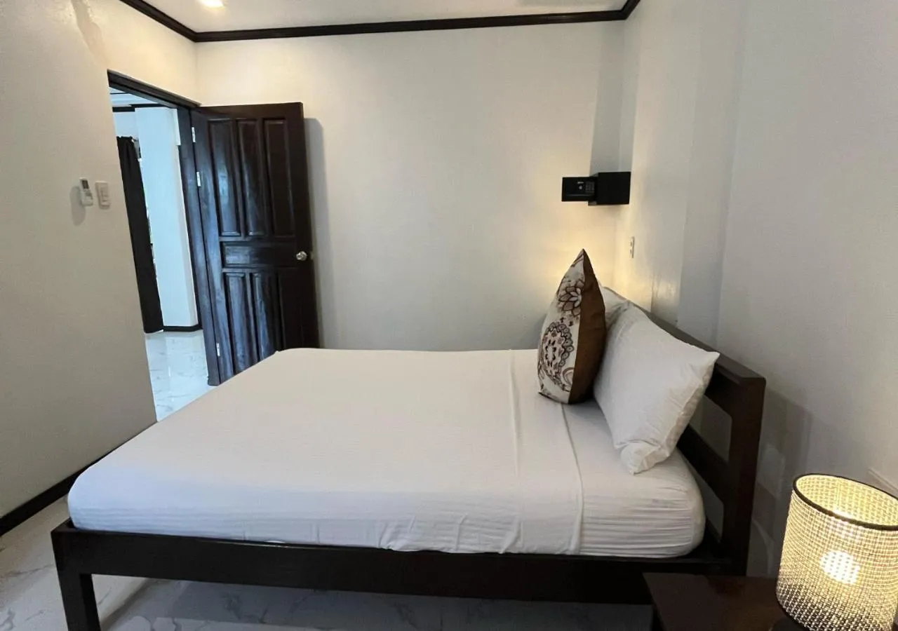 Bed in Hotel Oasis Port Barton