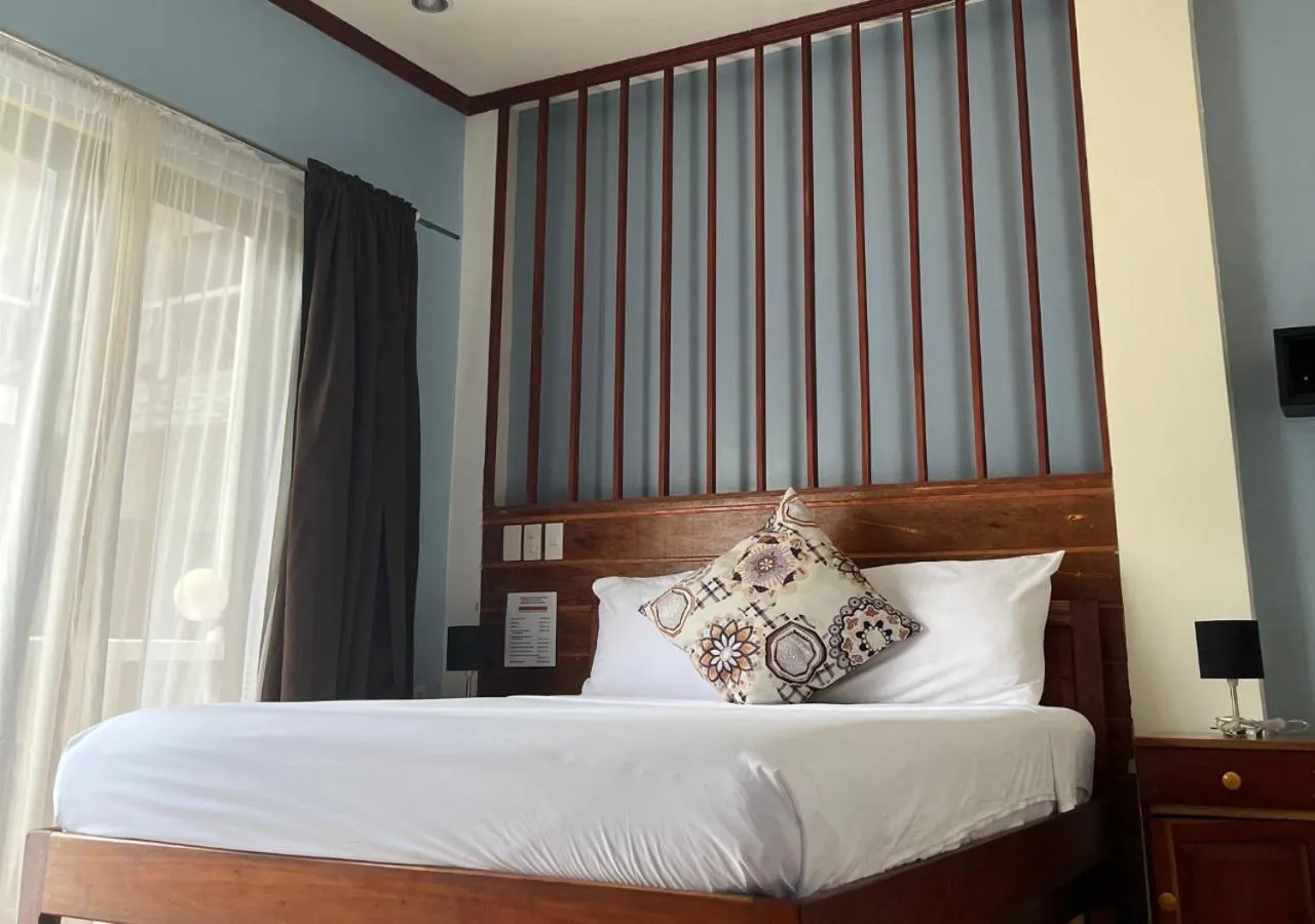 Bed in Hotel Oasis Port Barton