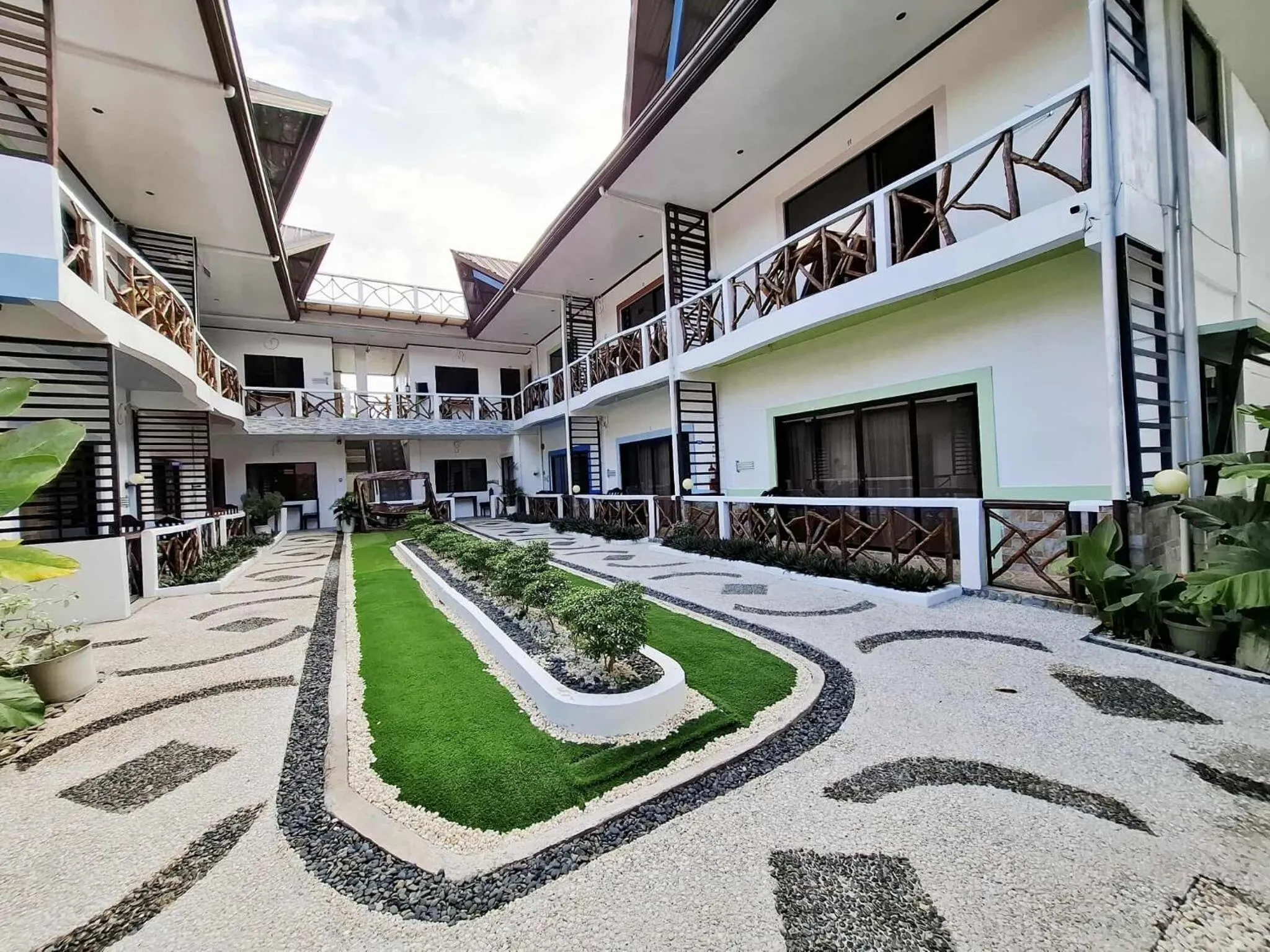 Property building in Hotel Oasis Port Barton