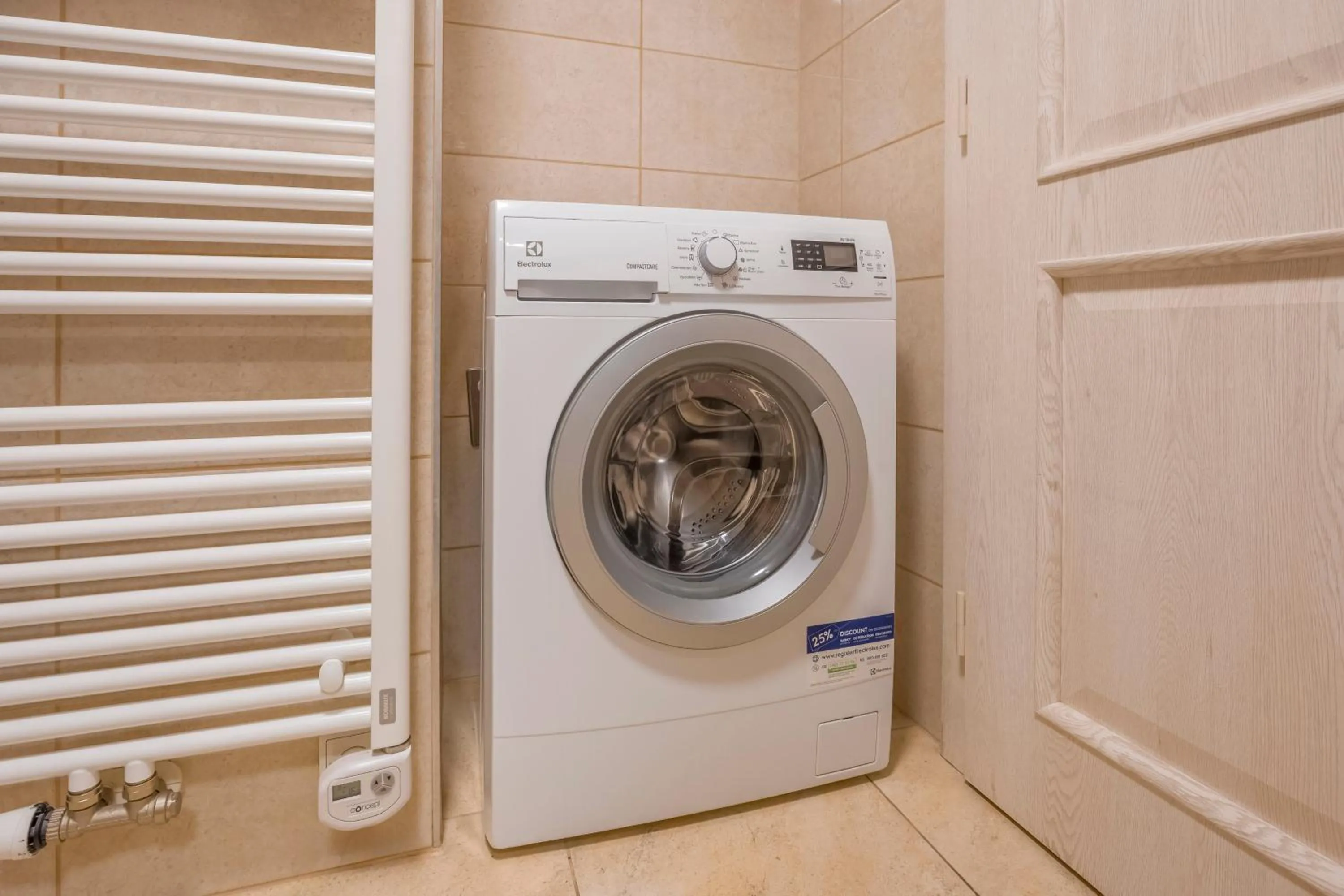 washing machine in Louren Apartments