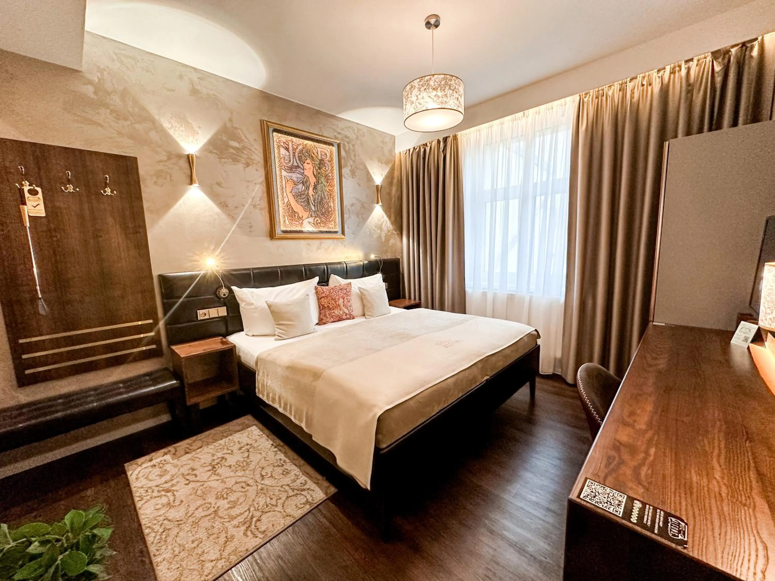 Bed in Alfons Boutique Hotel