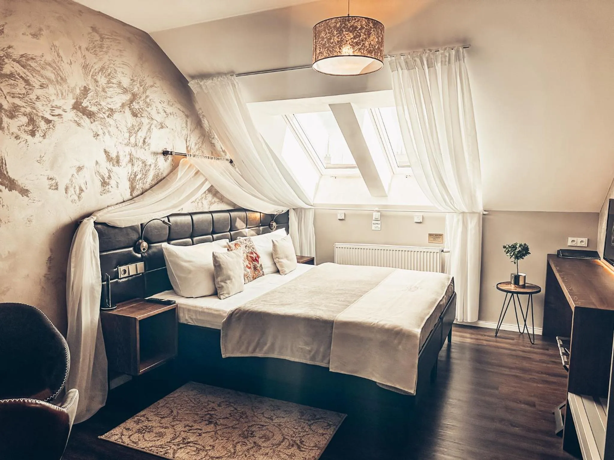 Bed in Alfons Boutique Hotel