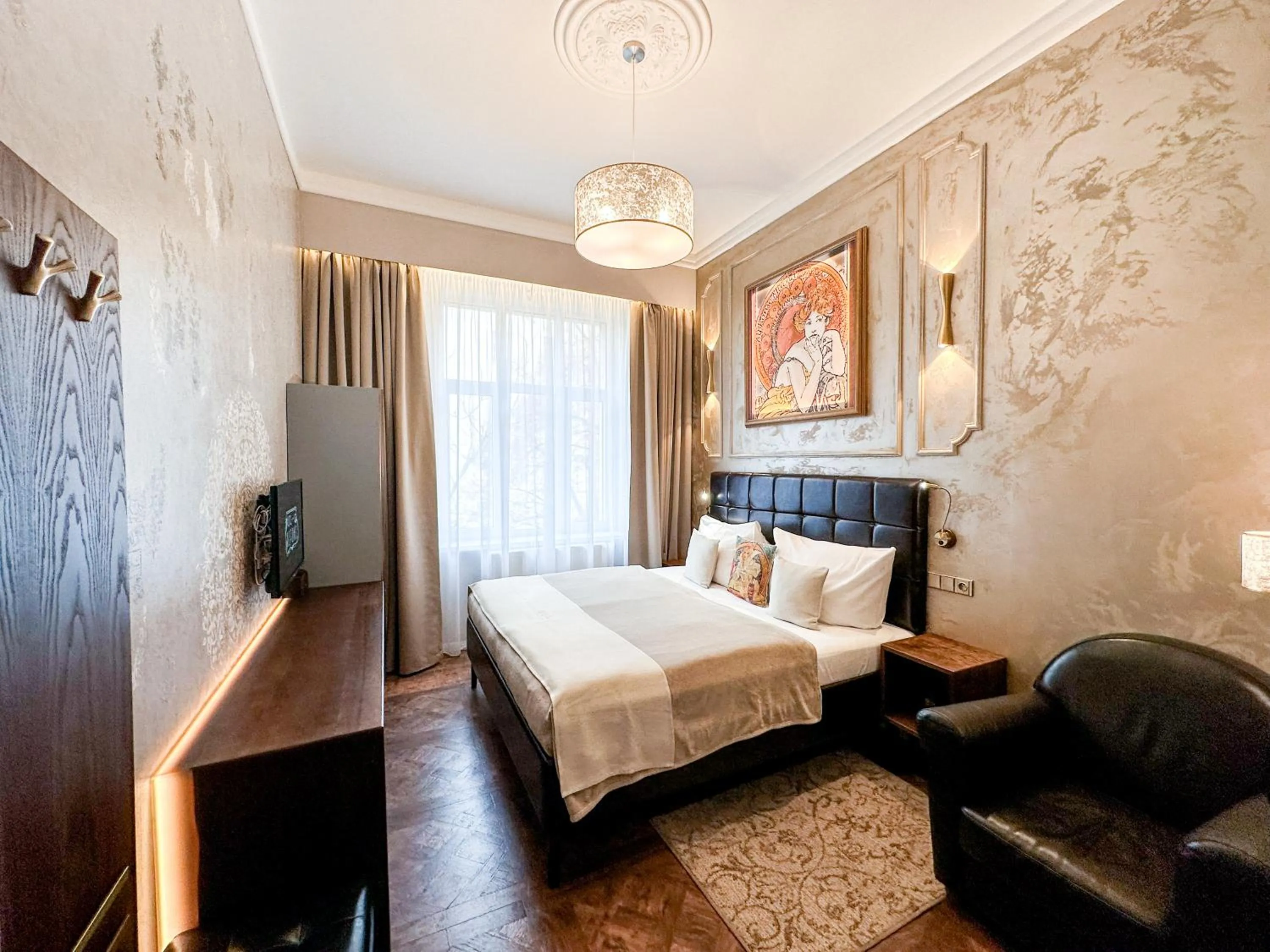 Bed in Alfons Boutique Hotel