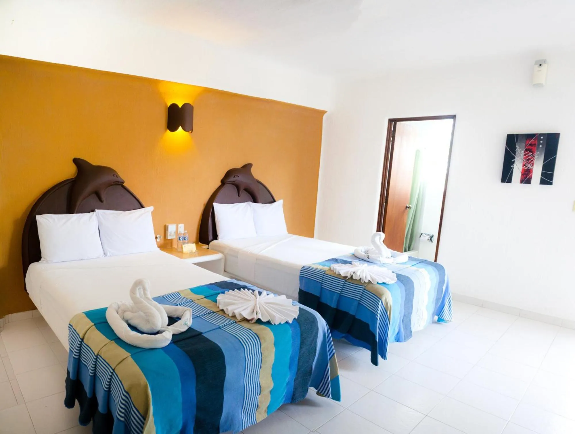 Bed in Hotel Bahia Huatulco