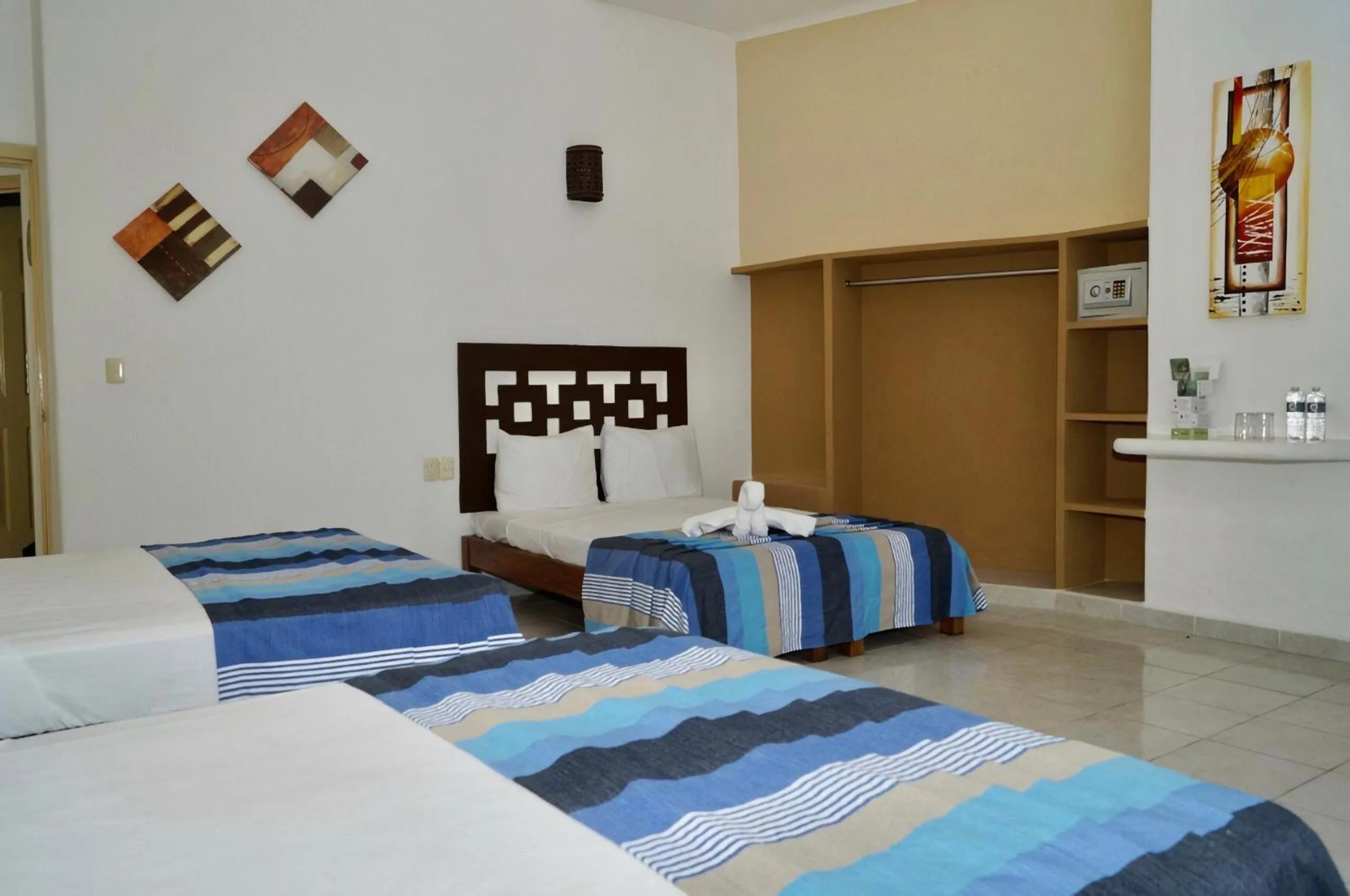 Bed in Hotel Bahia Huatulco