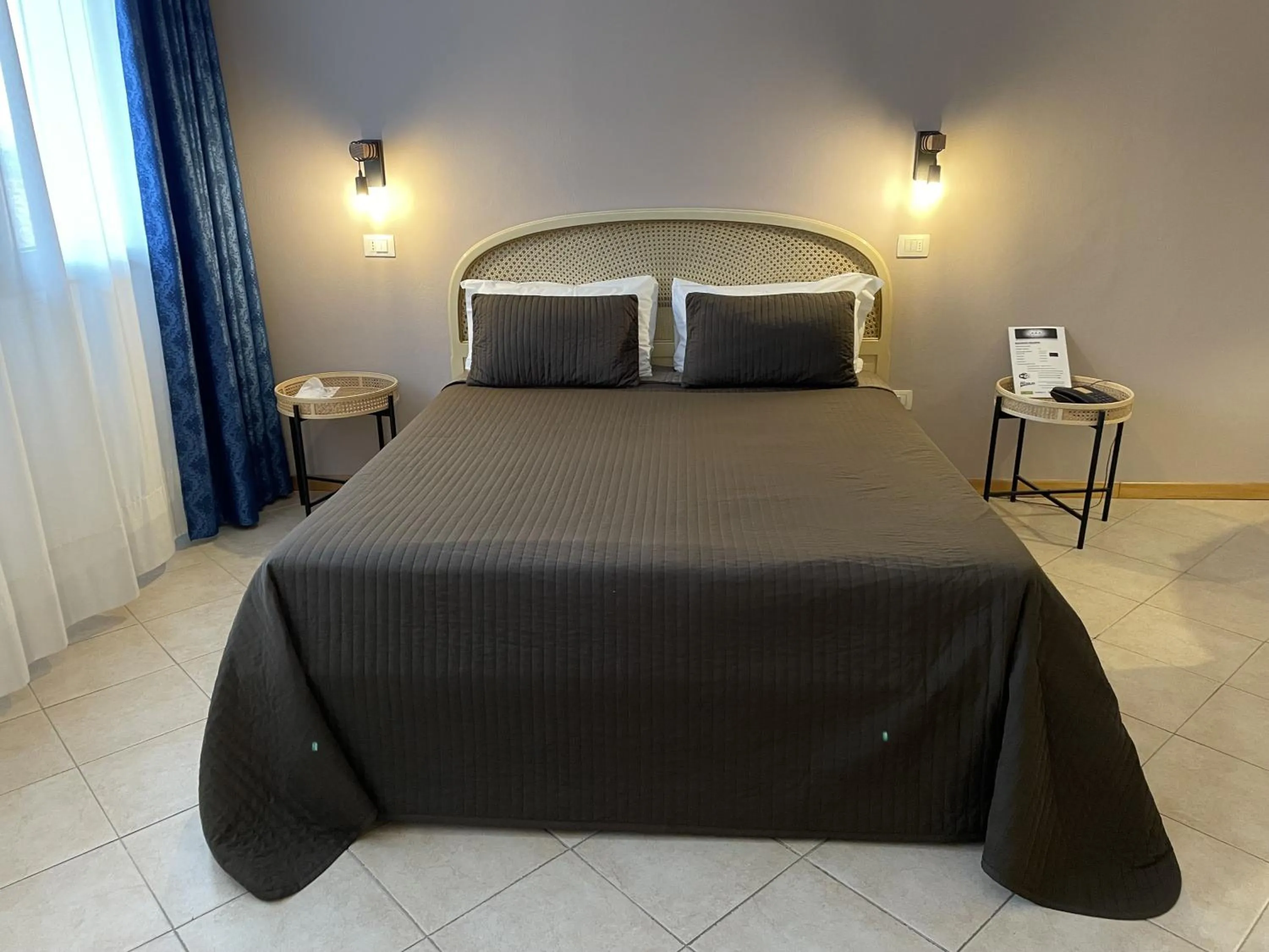 Bed in Hotel Petrarca