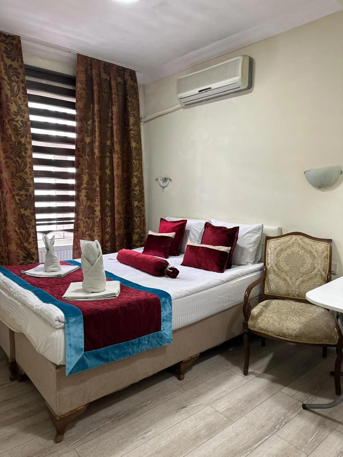 Property building, Bed in Happy Suite Boutique Hotel