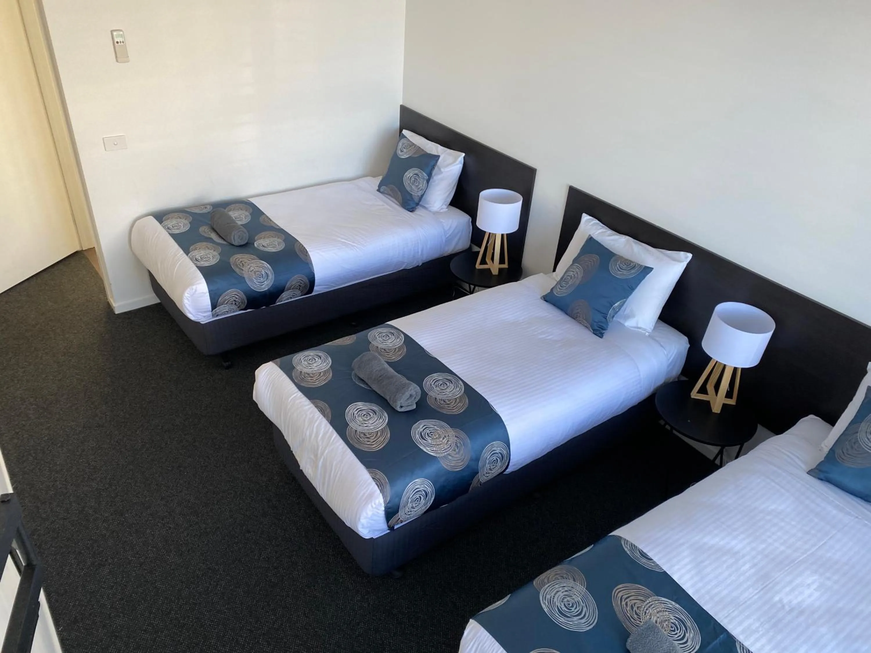 Bed in Southern Ocean Motor Inn