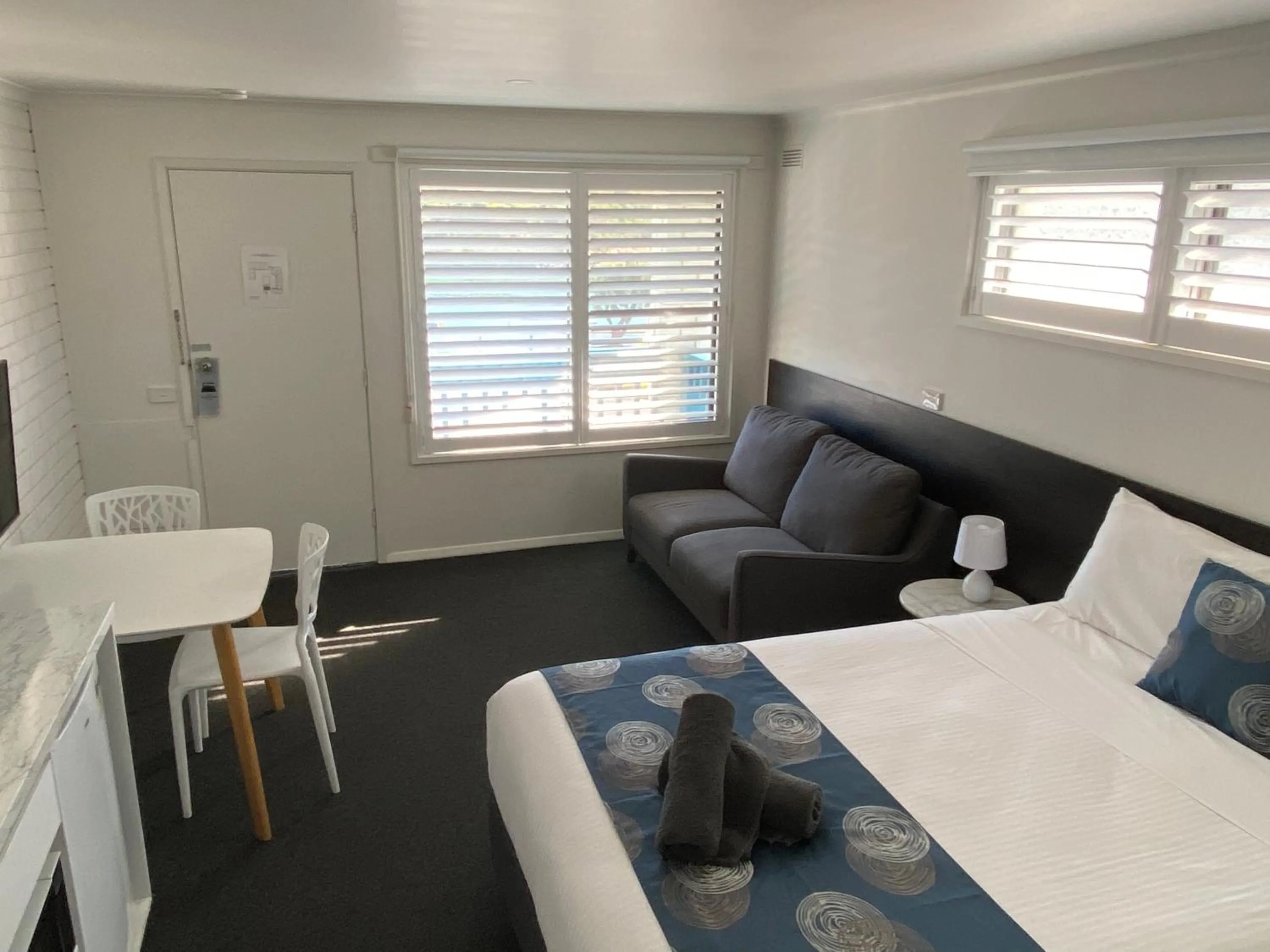 Bed in Southern Ocean Motor Inn