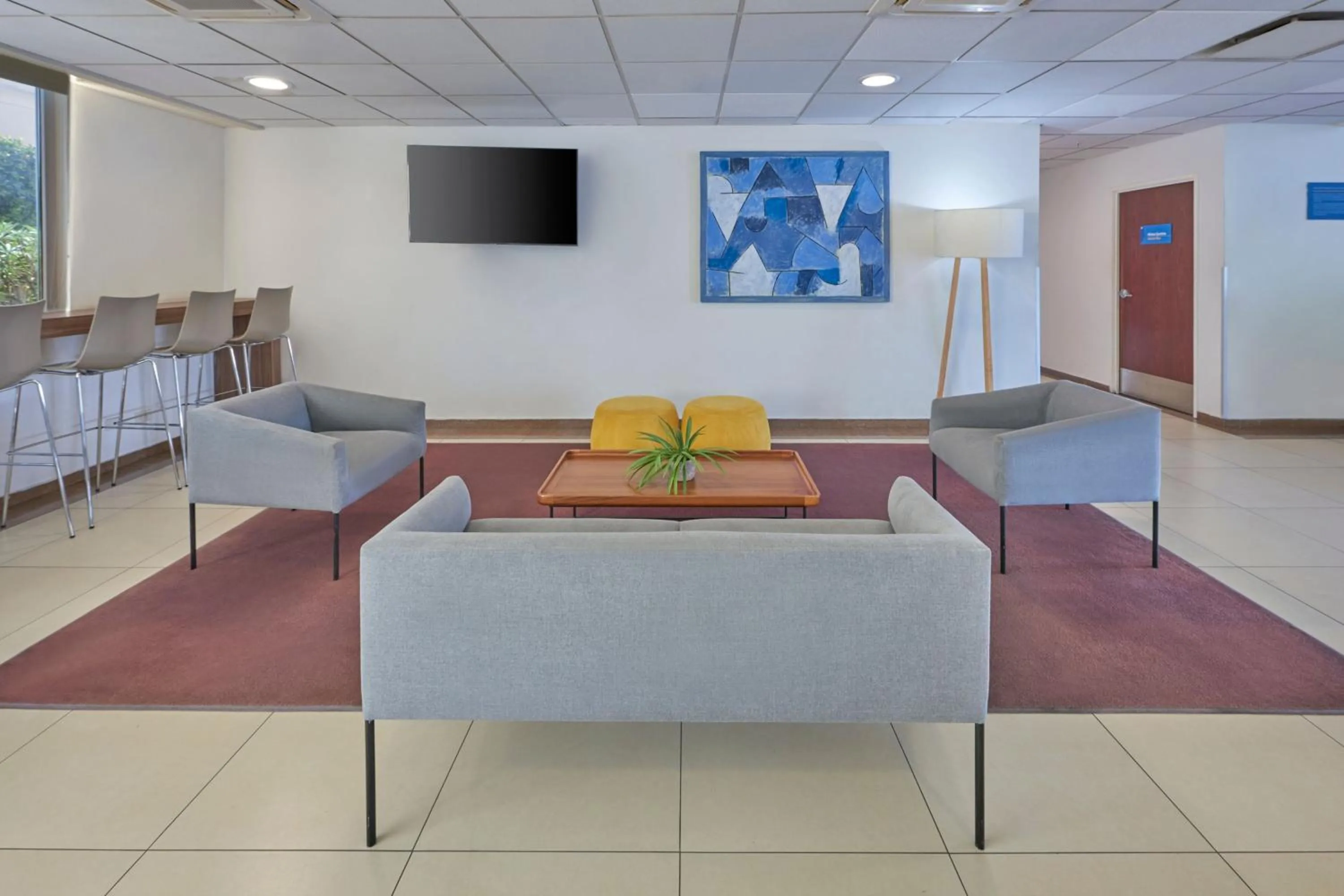 Lobby or reception in City Express by Marriott Manzanillo