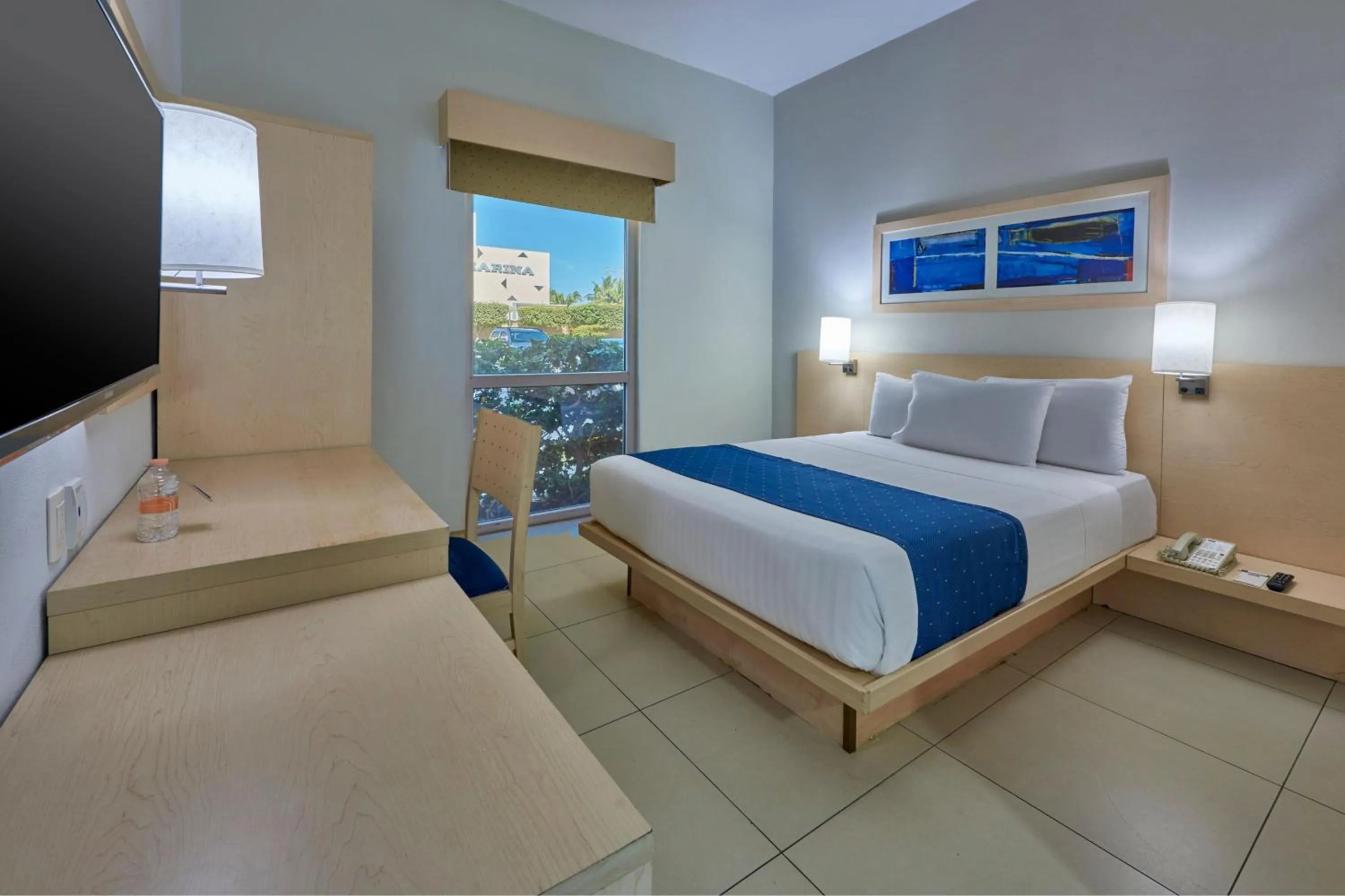 Photo of the whole room, Bed in City Express by Marriott Manzanillo