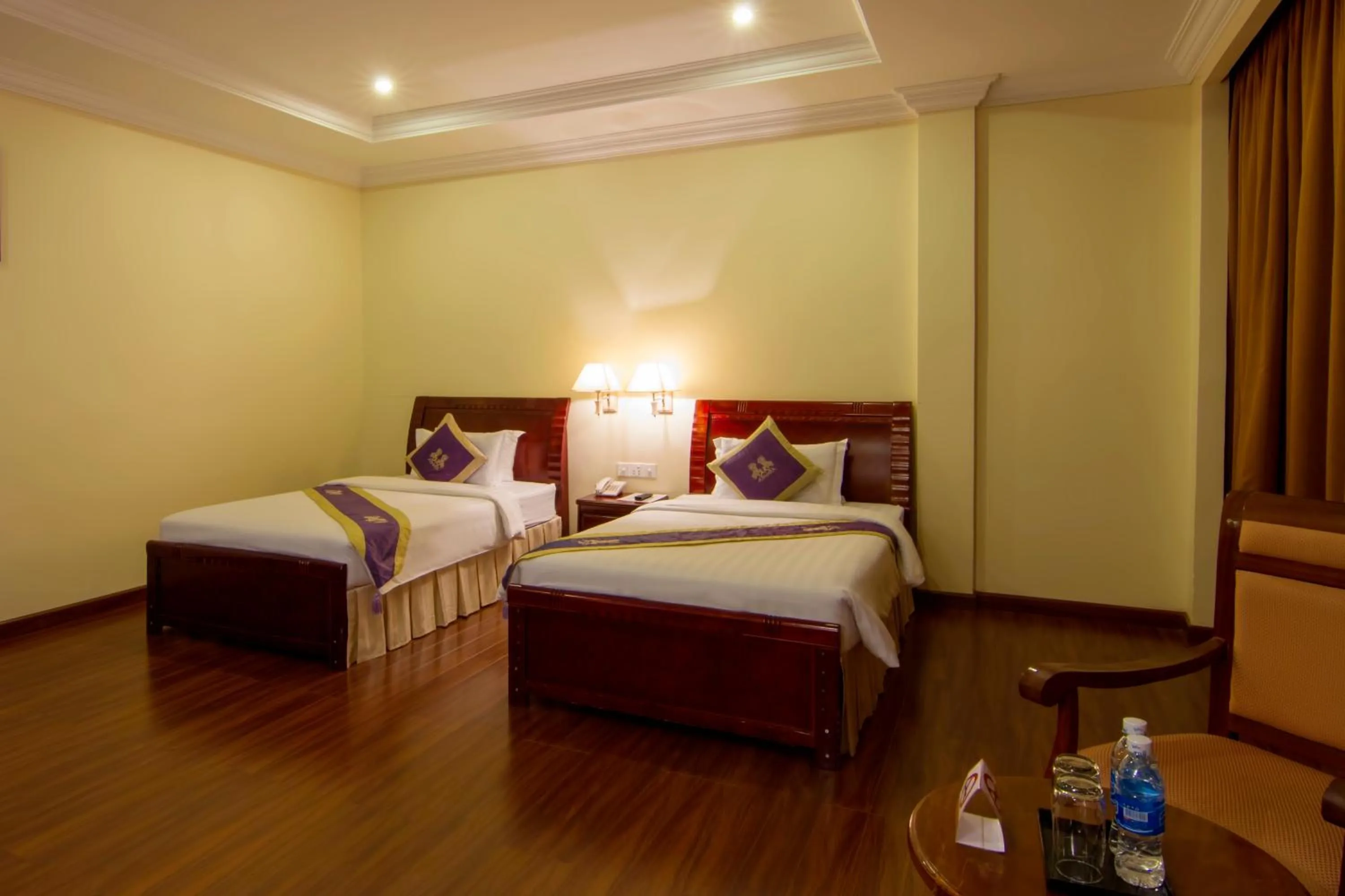 Bed in Starry Angkor Hotel