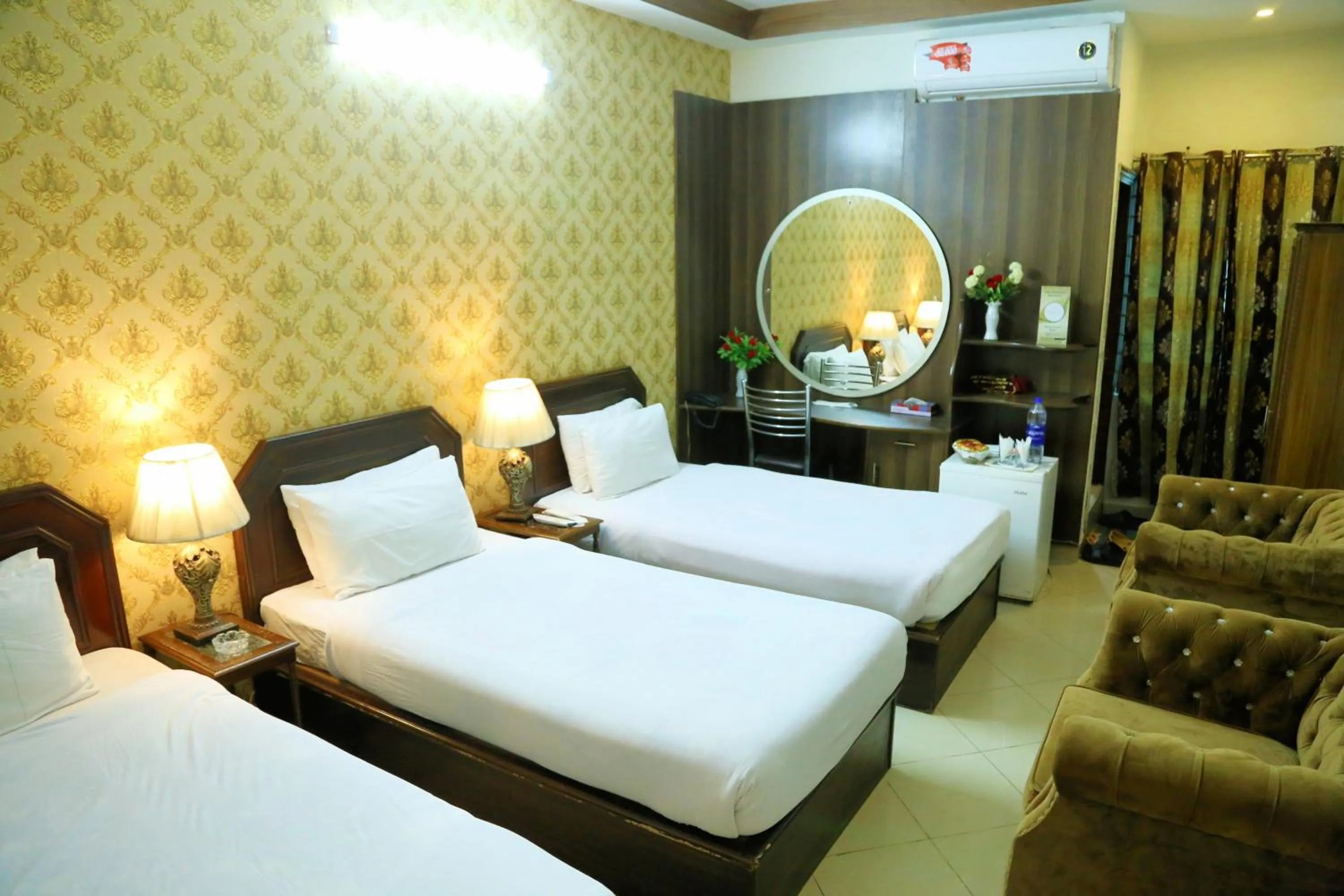 Bed in Fiesta Inn Hotel & Resorts Multan