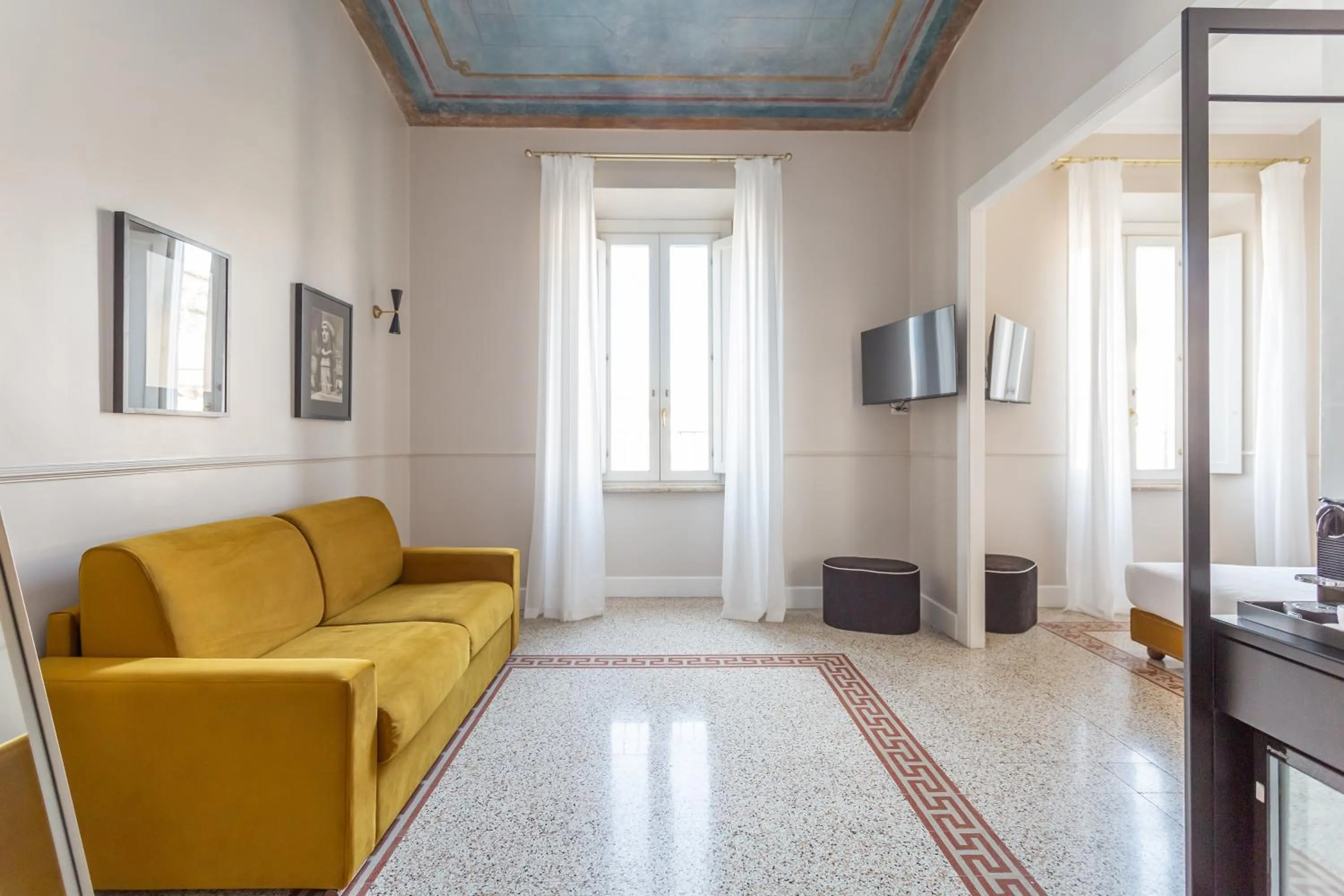 Living room in Daplace - La Mongolfiera Rooms in Navona