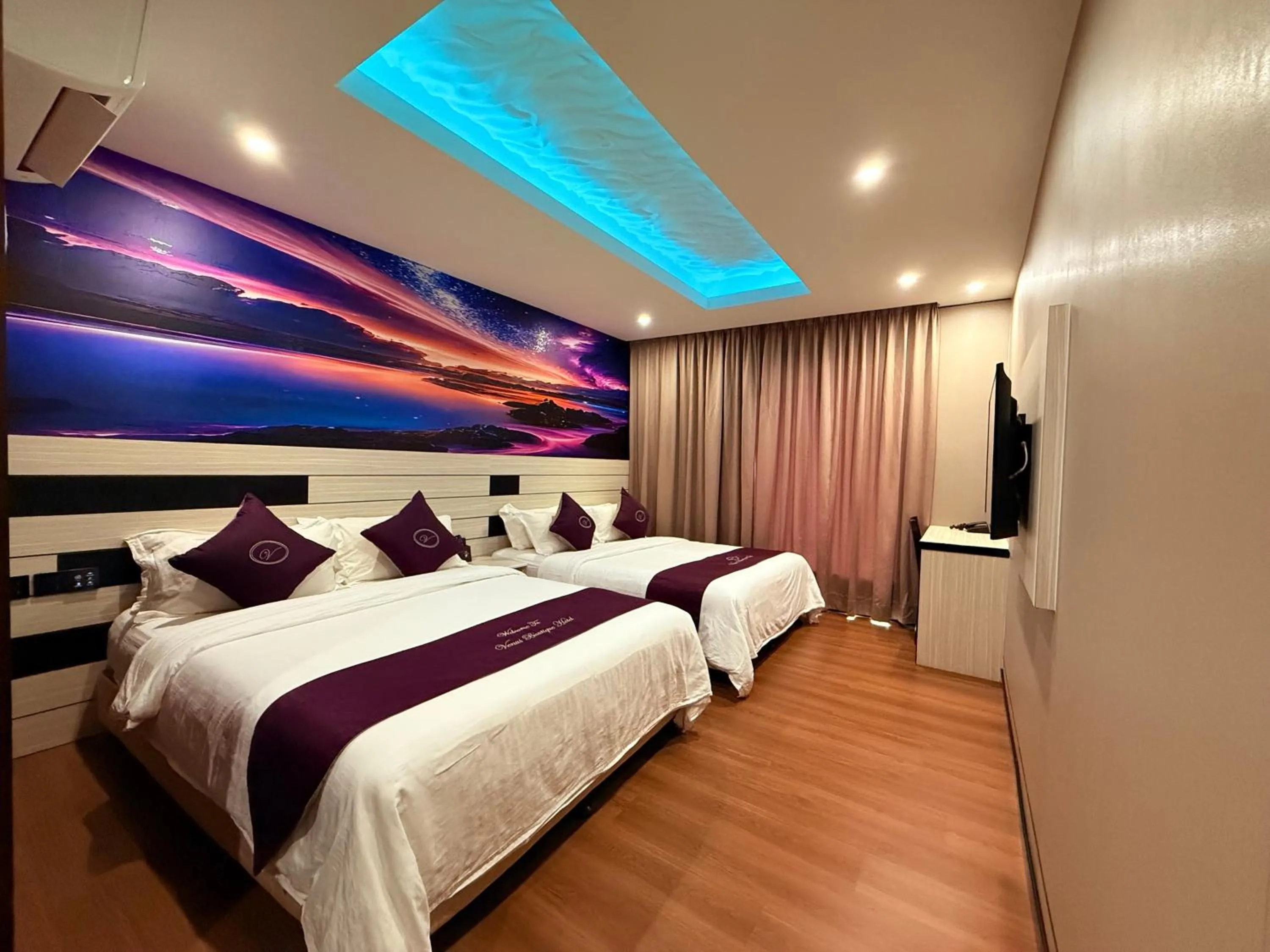 Bed in Venus Boutique Hotel