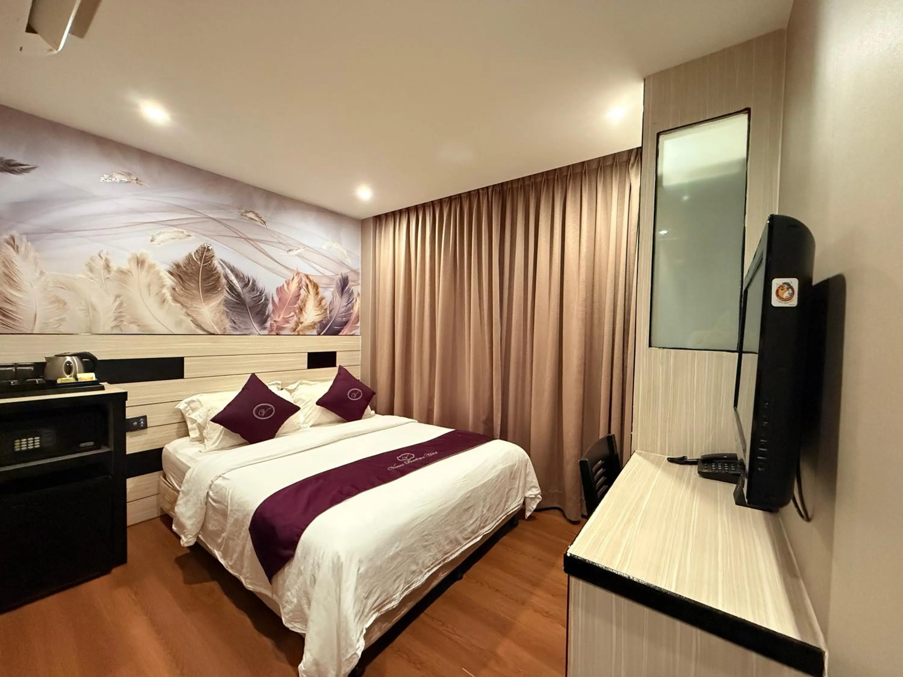 Bed in Venus Boutique Hotel