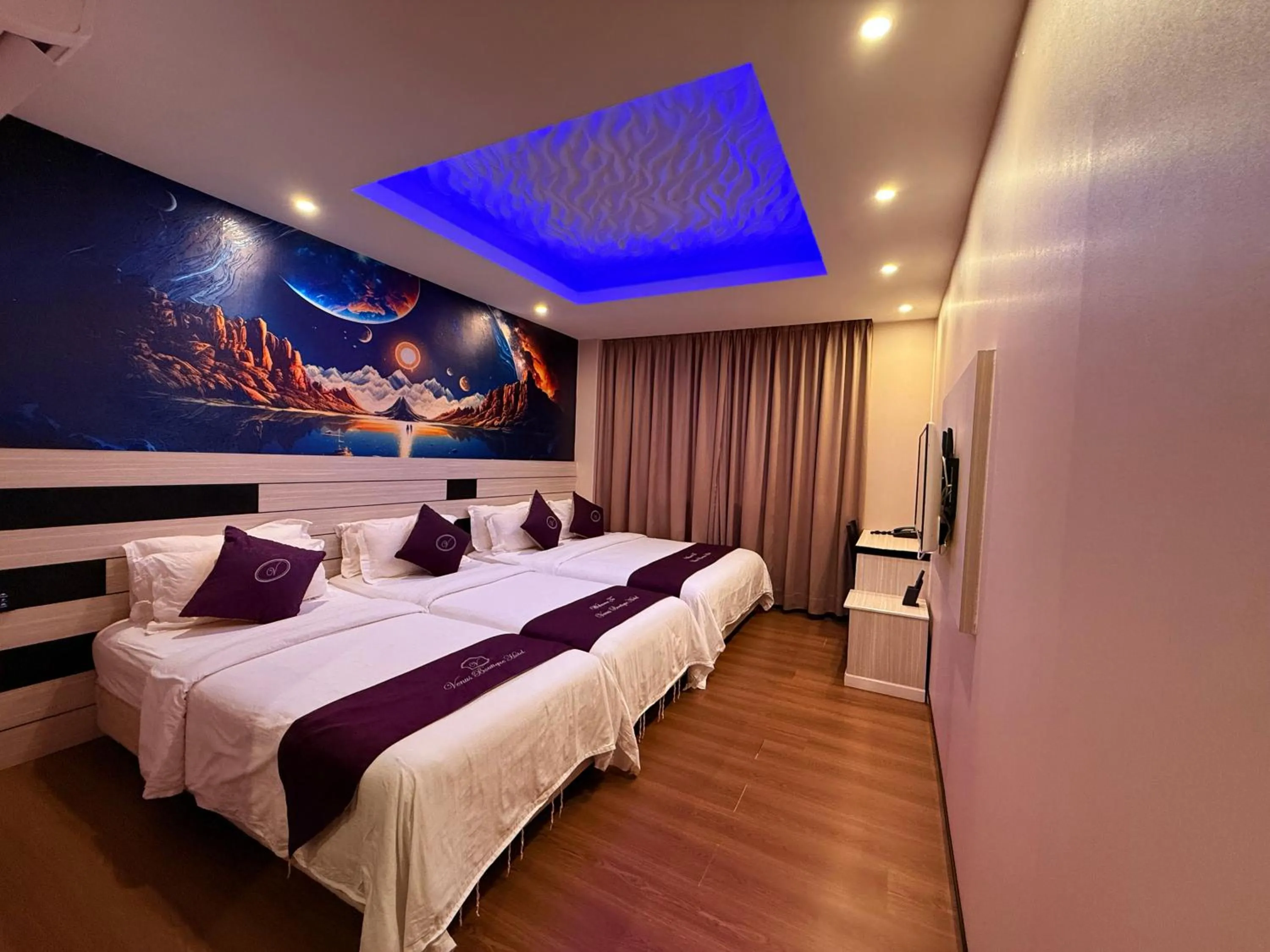 Bed in Venus Boutique Hotel