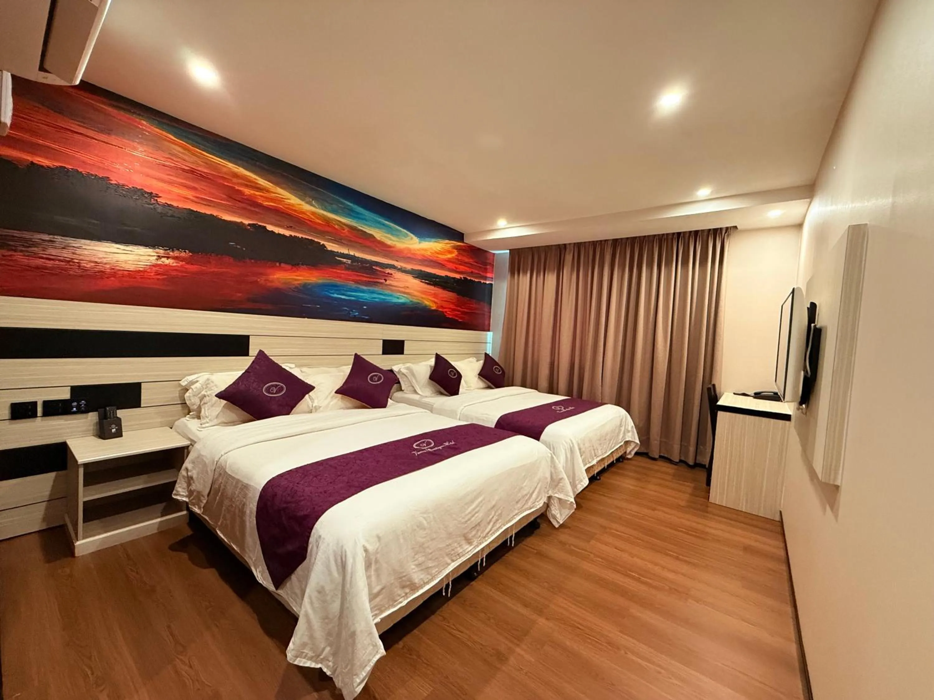 Bed in Venus Boutique Hotel