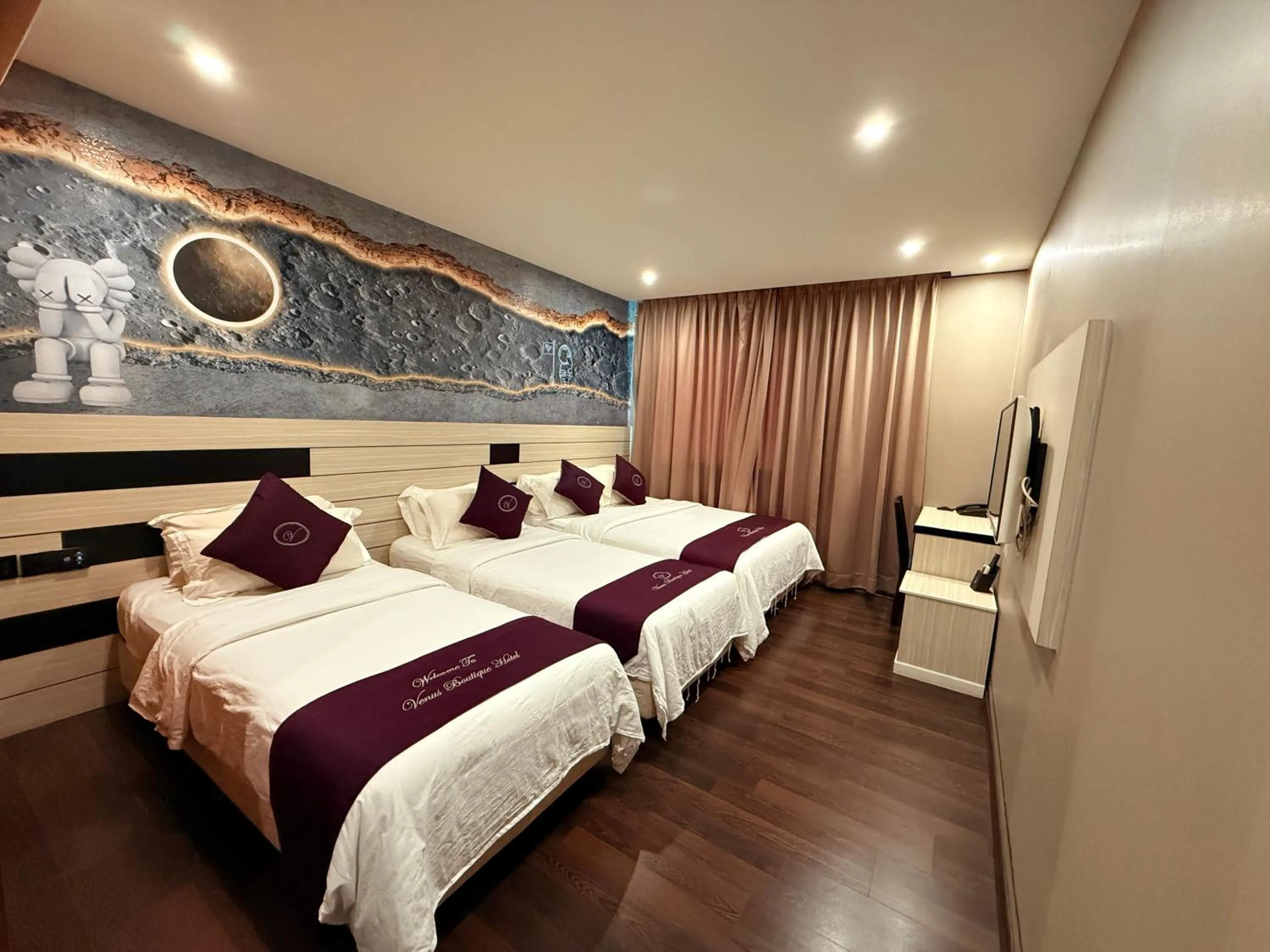 Bed in Venus Boutique Hotel