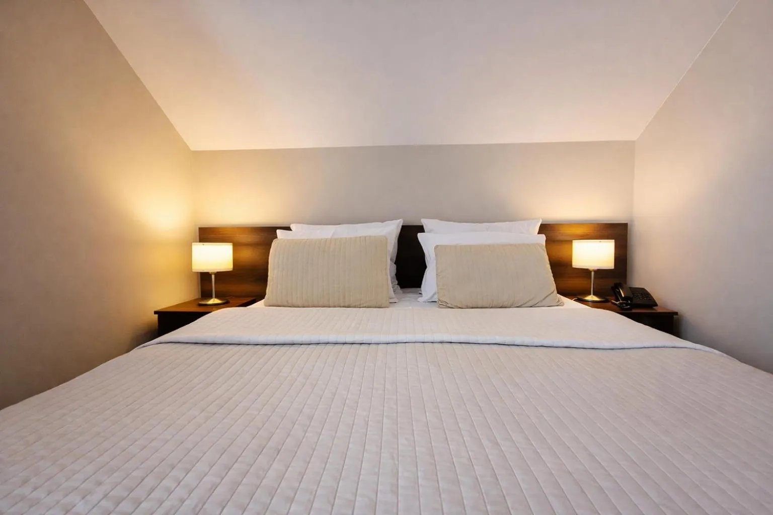 Bed in Hotel Kantoria