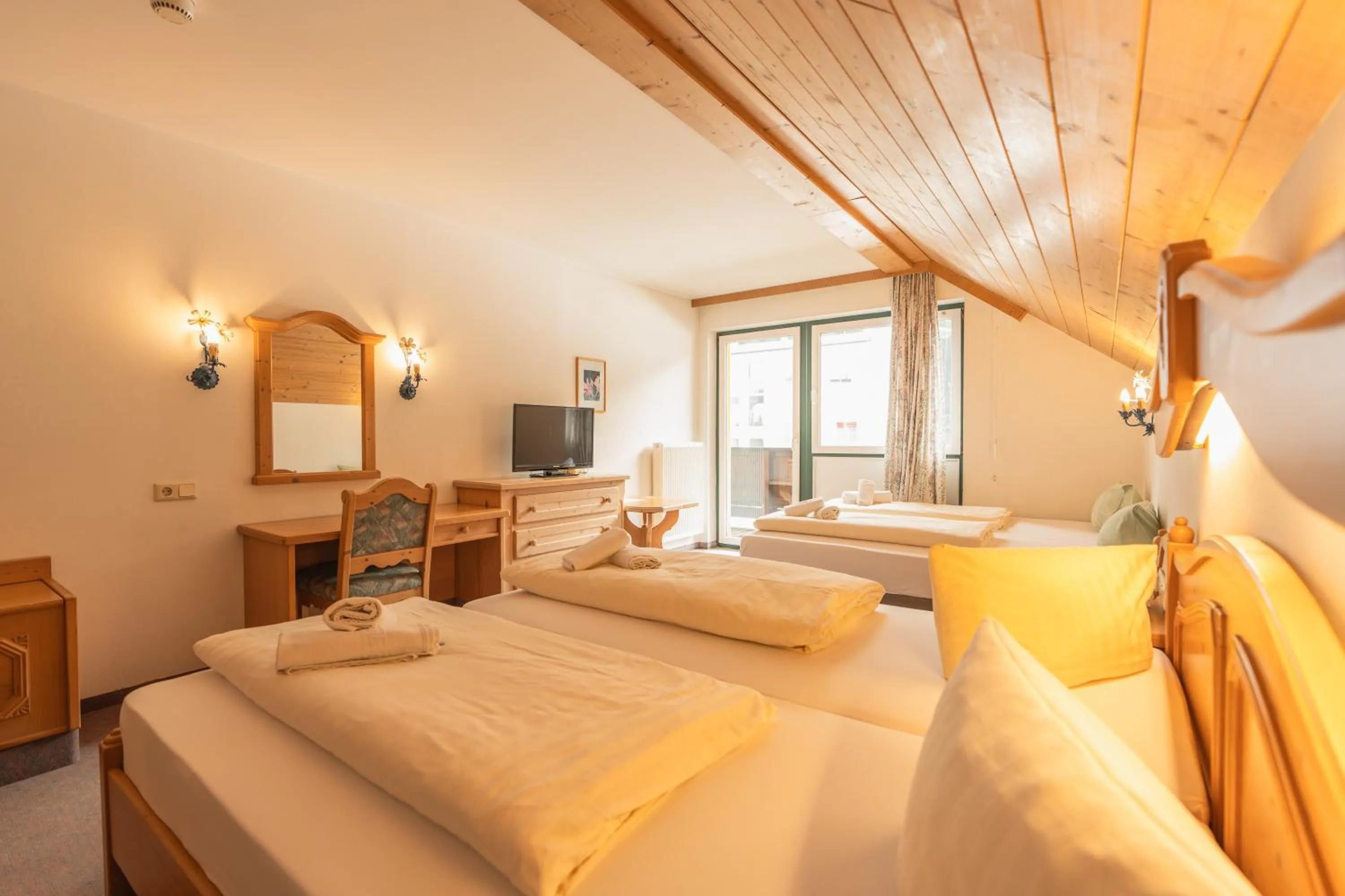 Photo of the whole room, Bed in Hotel Gruberhof Innsbruck Igls B&B