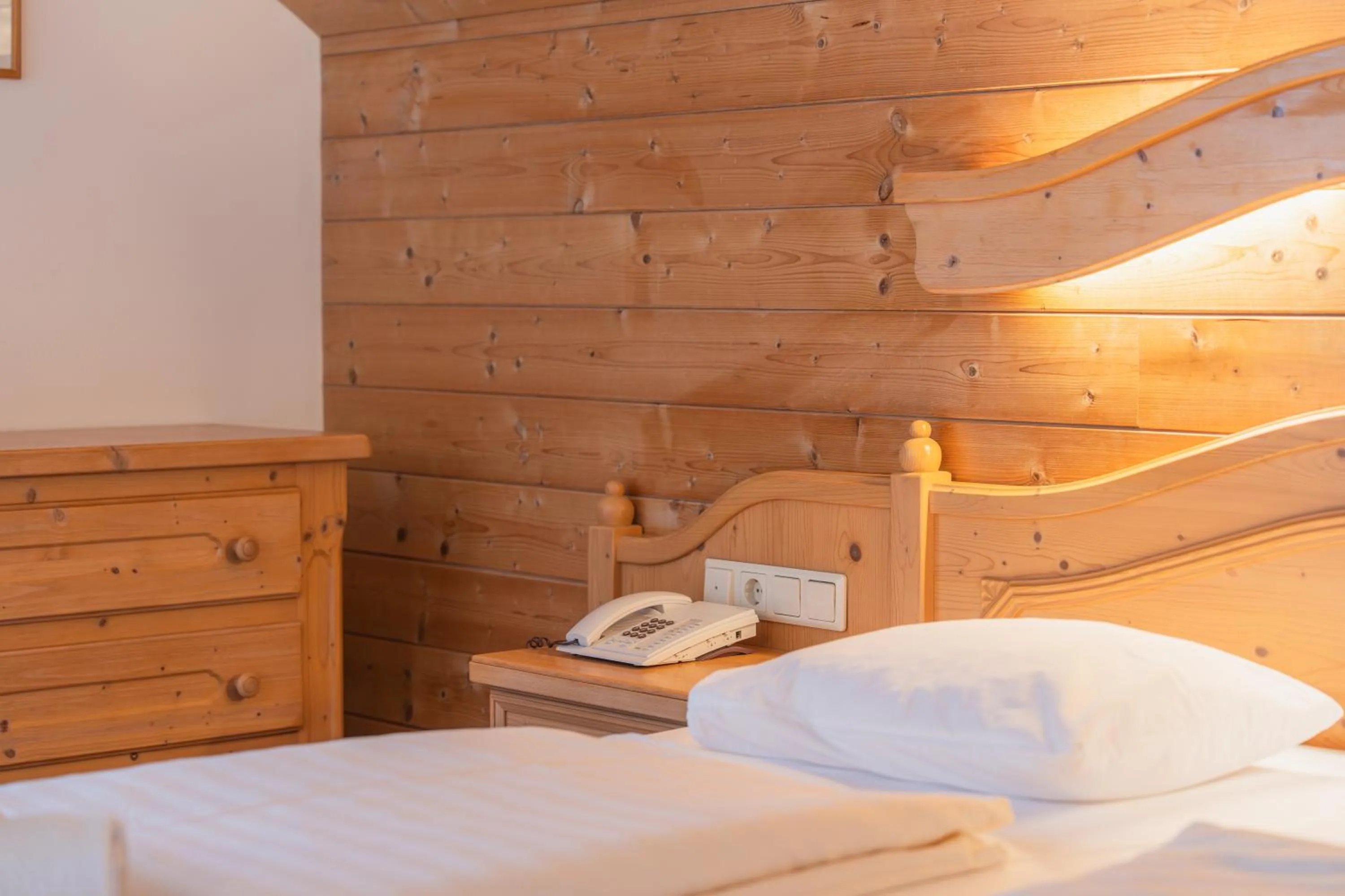 Bed in Hotel Gruberhof Innsbruck Igls B&B