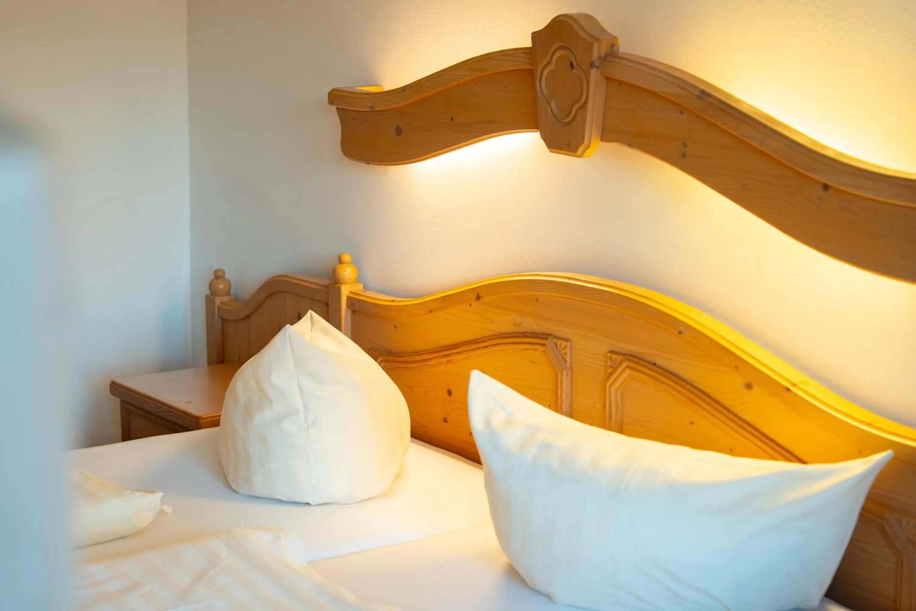 Bed in Hotel Gruberhof Innsbruck Igls B&B