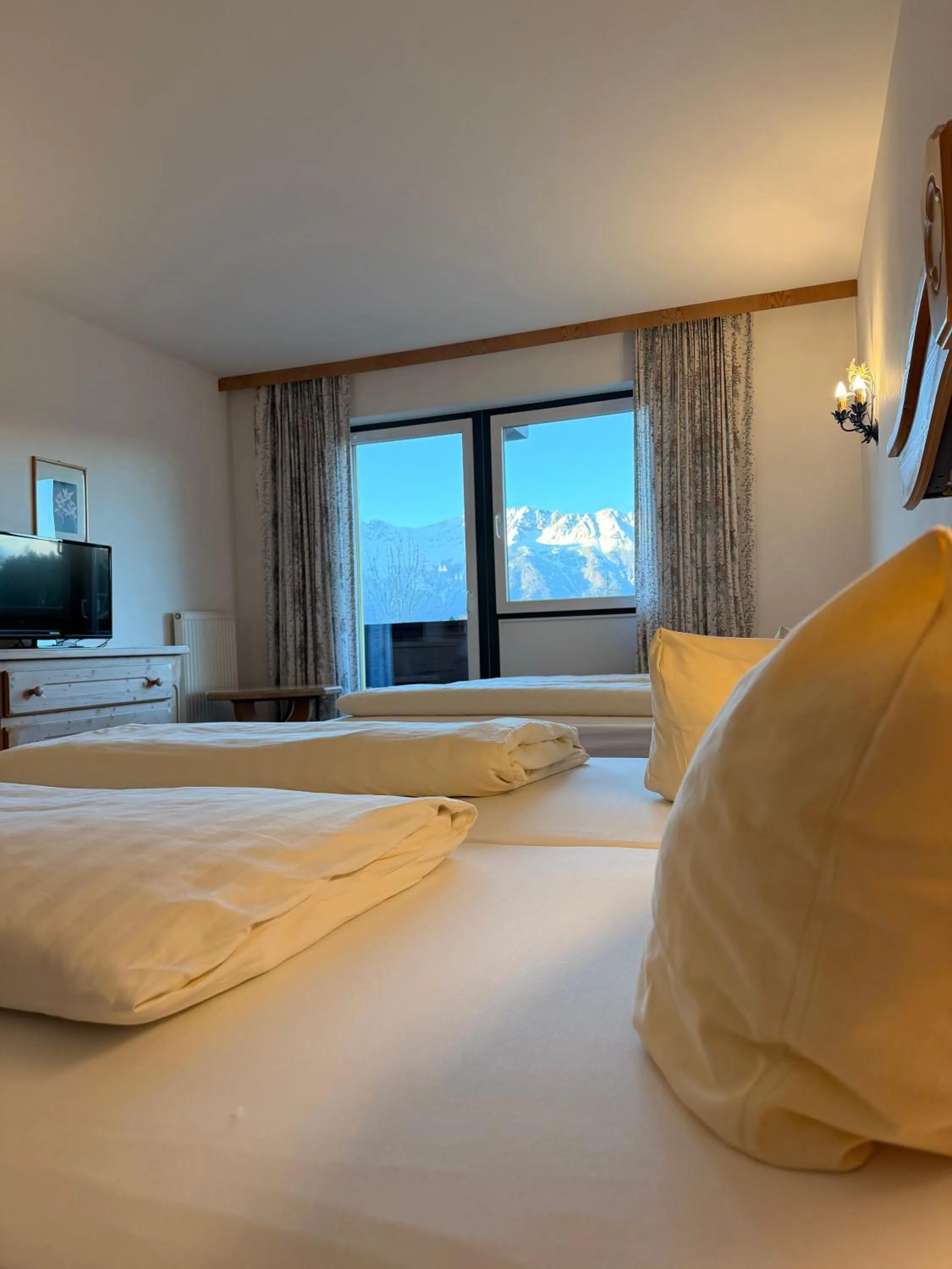 Bedroom, Bed in Hotel Gruberhof Innsbruck Igls B&B