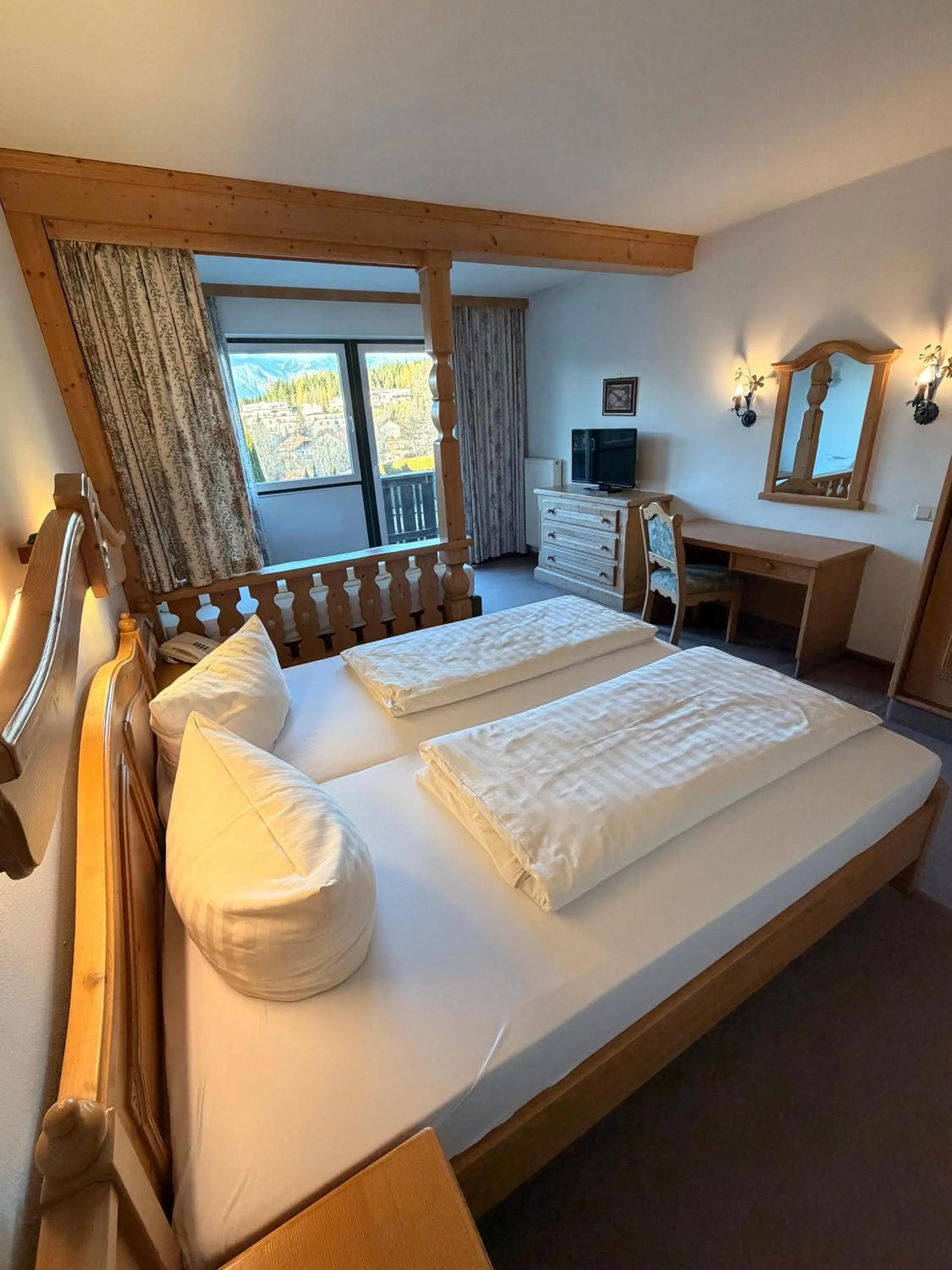 Bedroom, Bed in Hotel Gruberhof Innsbruck Igls B&B