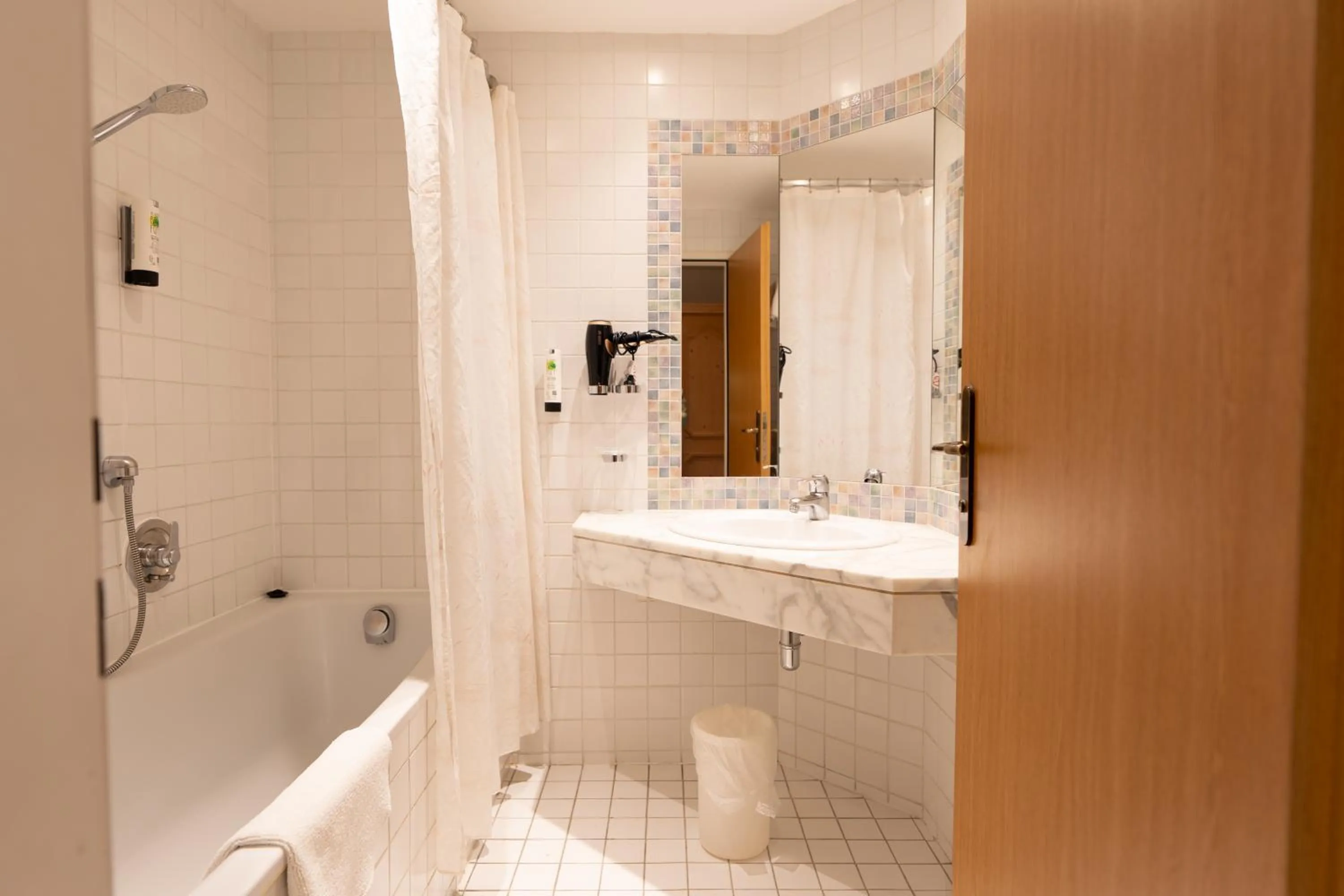 Bathroom in Hotel Gruberhof Innsbruck Igls B&B