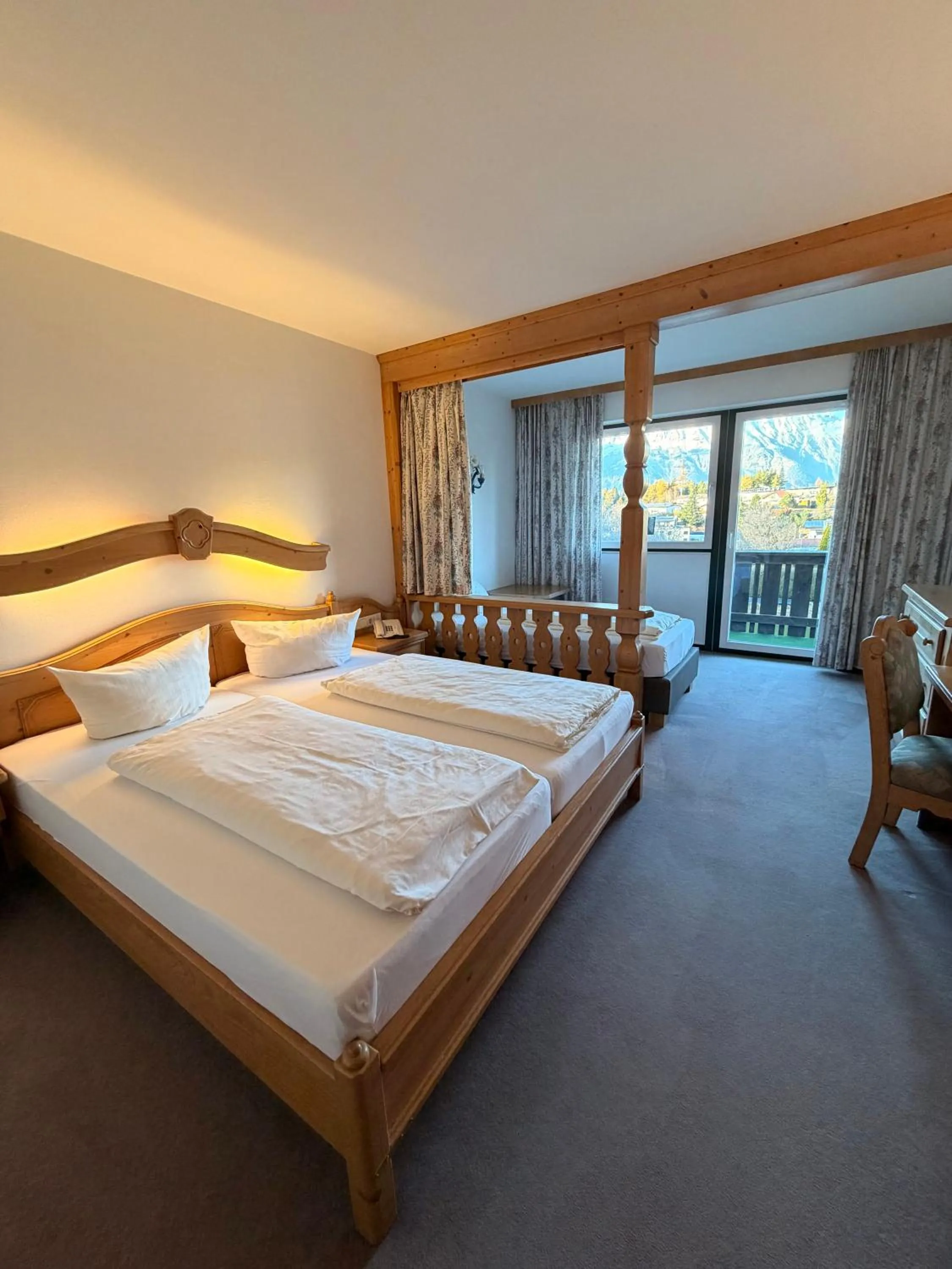 Bedroom, Bed in Hotel Gruberhof Innsbruck Igls B&B