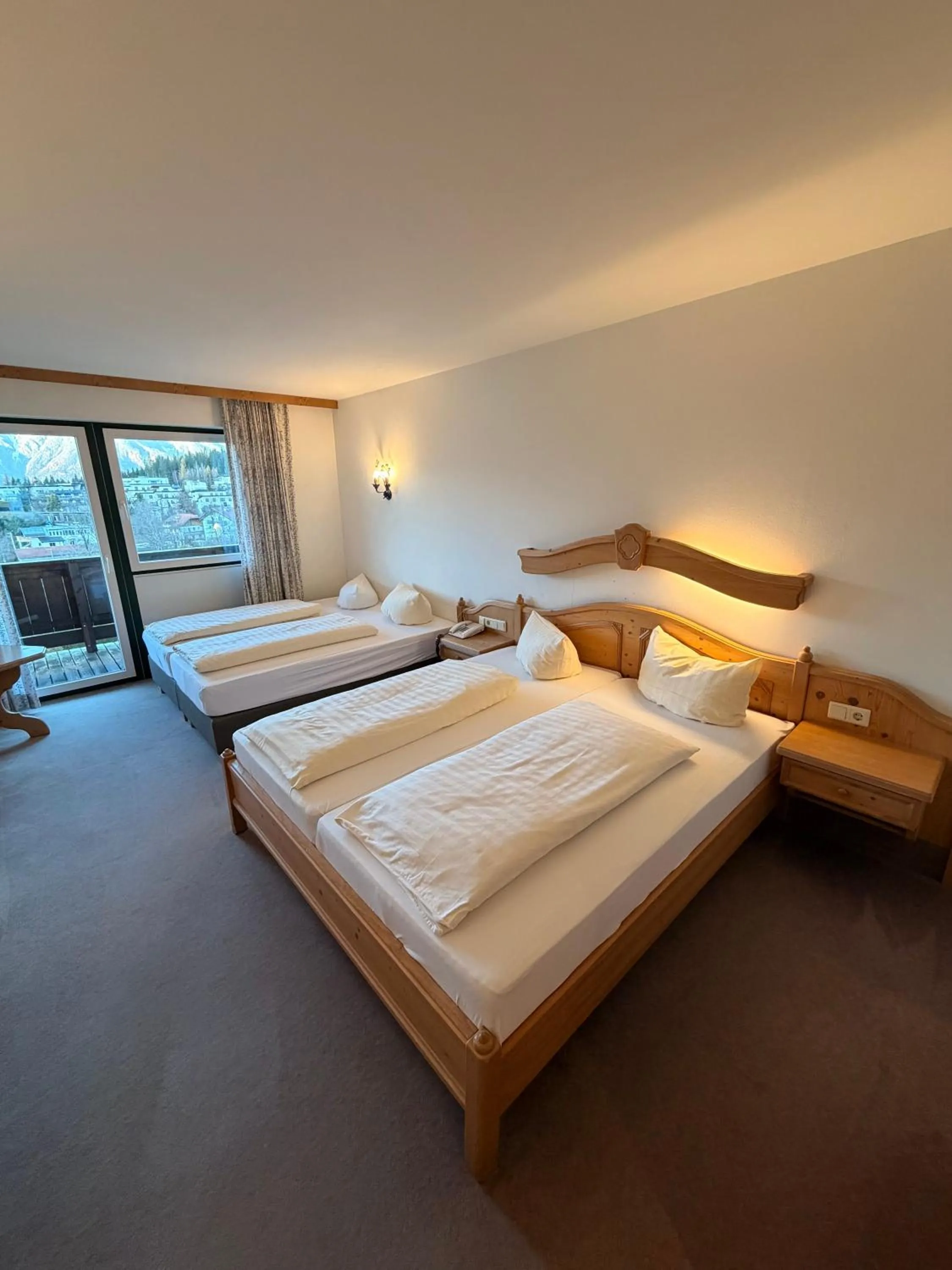 Bedroom, Bed in Hotel Gruberhof Innsbruck Igls B&B