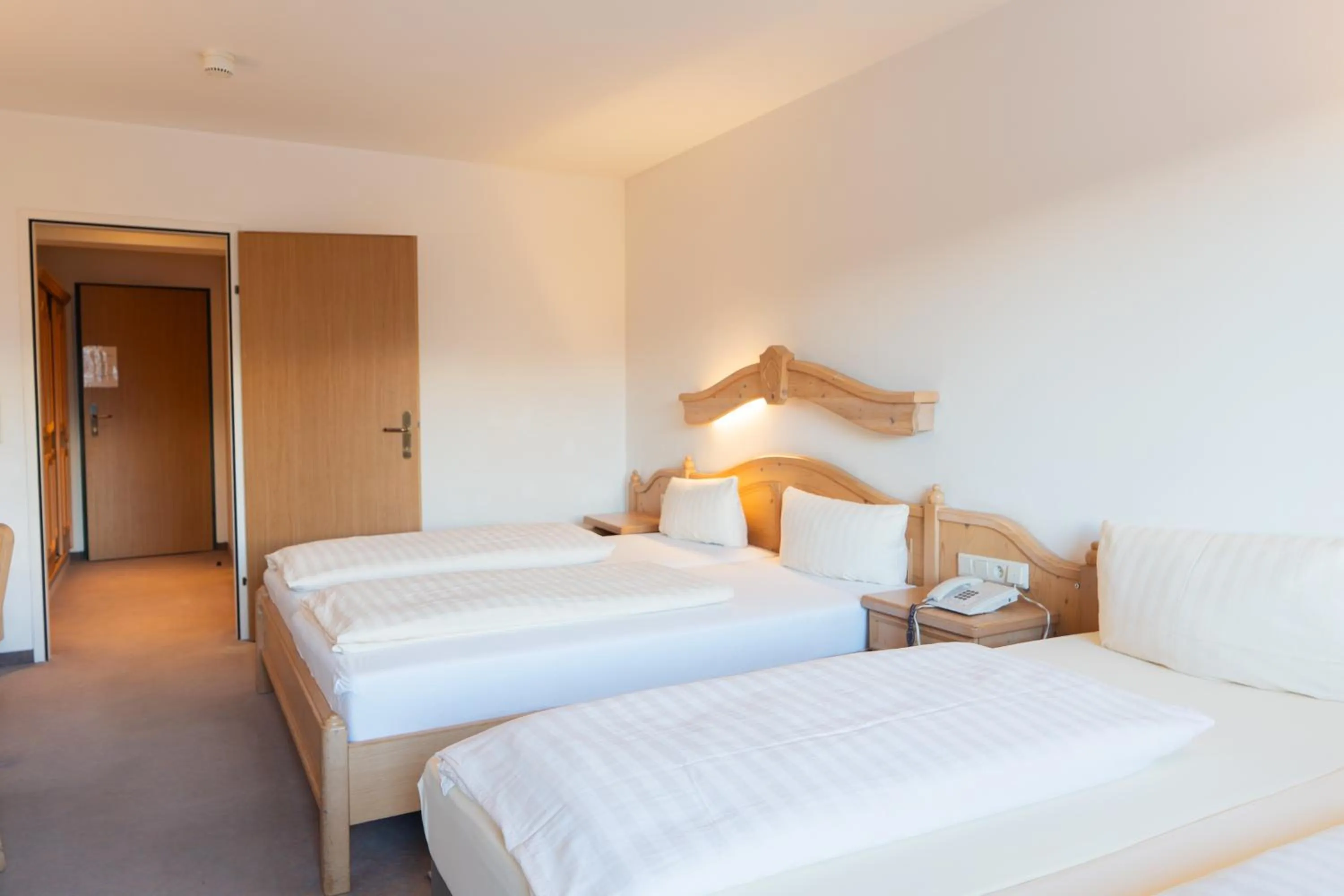 Bed in Hotel Gruberhof Innsbruck Igls B&B