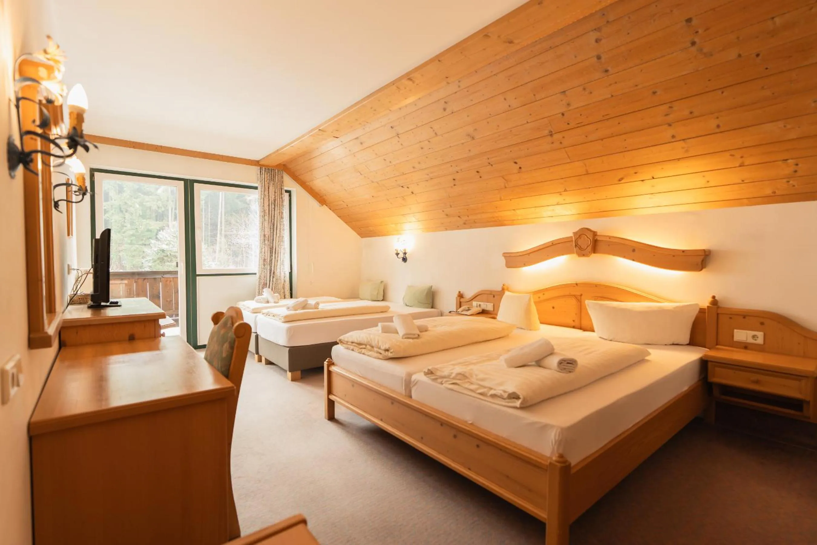 Photo of the whole room, Bed in Hotel Gruberhof Innsbruck Igls B&B