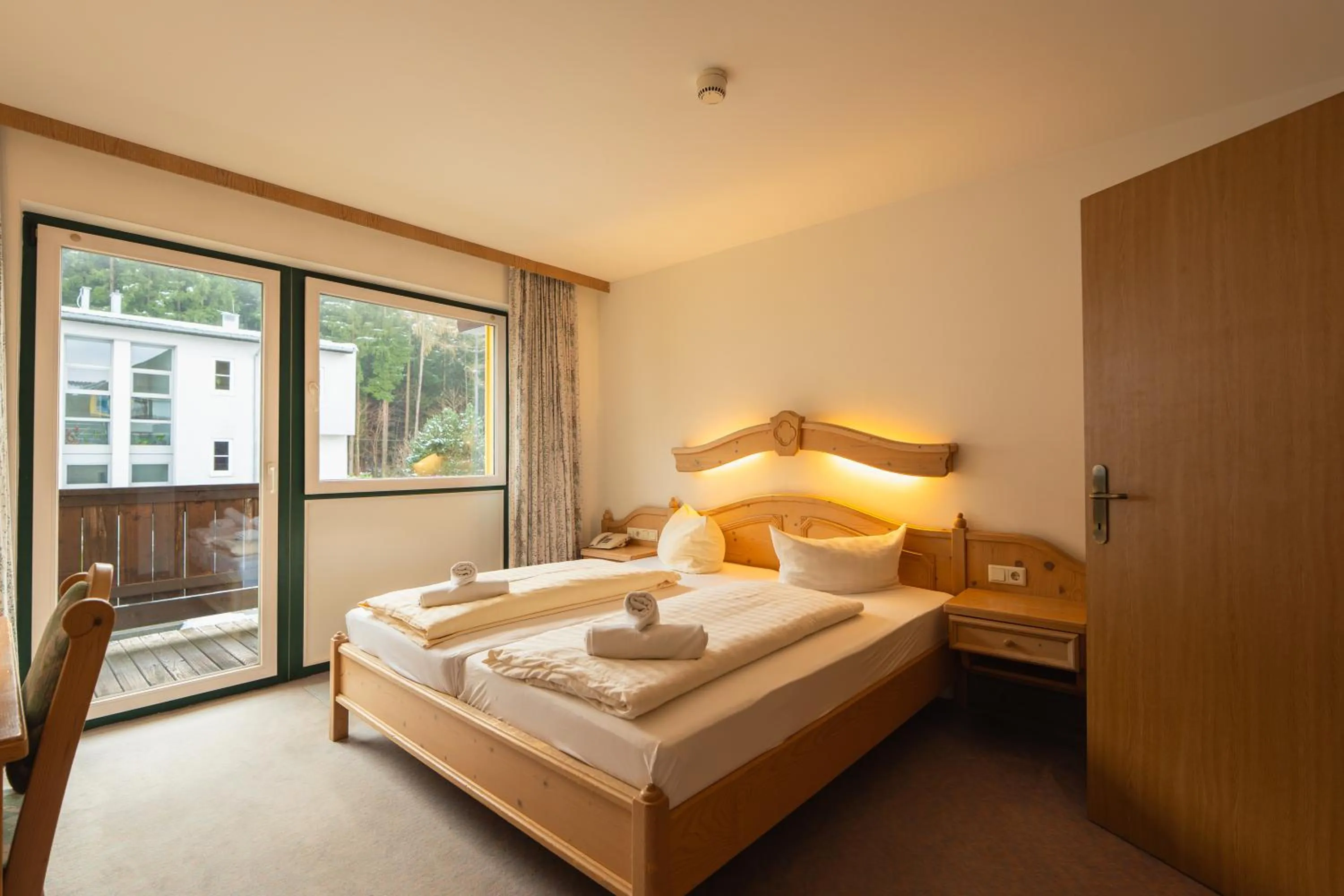 Bed in Hotel Gruberhof Innsbruck Igls B&B