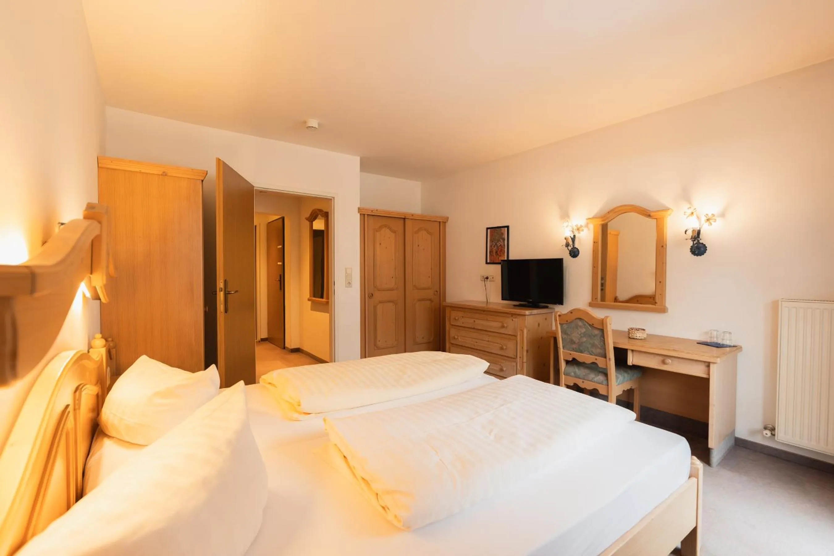 Photo of the whole room, Bed in Hotel Gruberhof Innsbruck Igls B&B