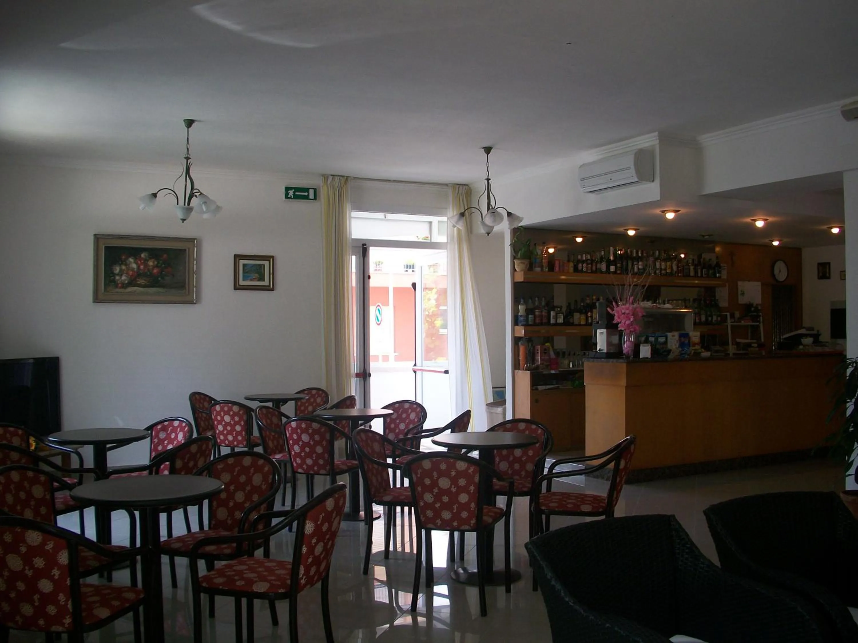 Communal lounge/ TV room in Hotel Liliana