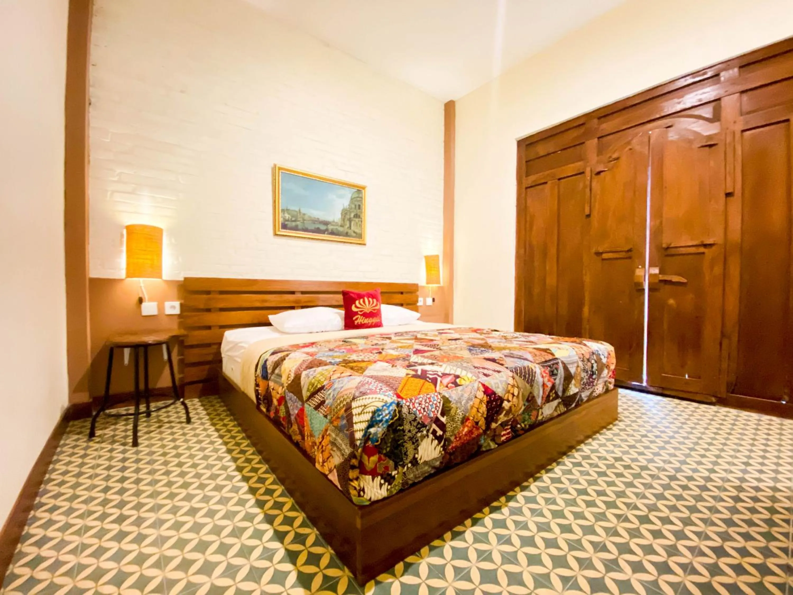 Photo of the whole room, Bed in Hinggil Homestay Syariah Malioboro Yogya Mitra RedDoorz