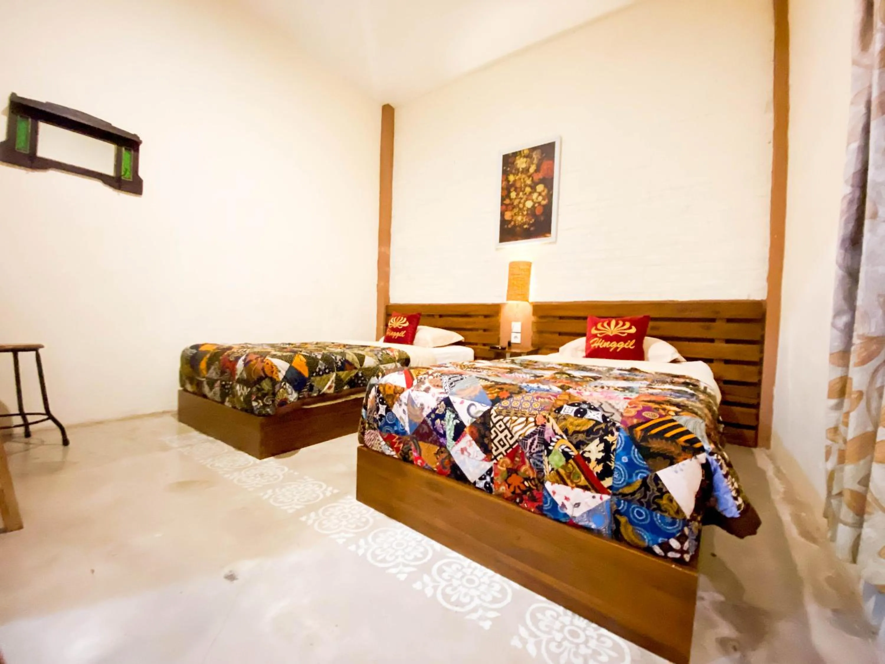 Photo of the whole room, Bed in Hinggil Homestay Syariah Malioboro Yogya Mitra RedDoorz