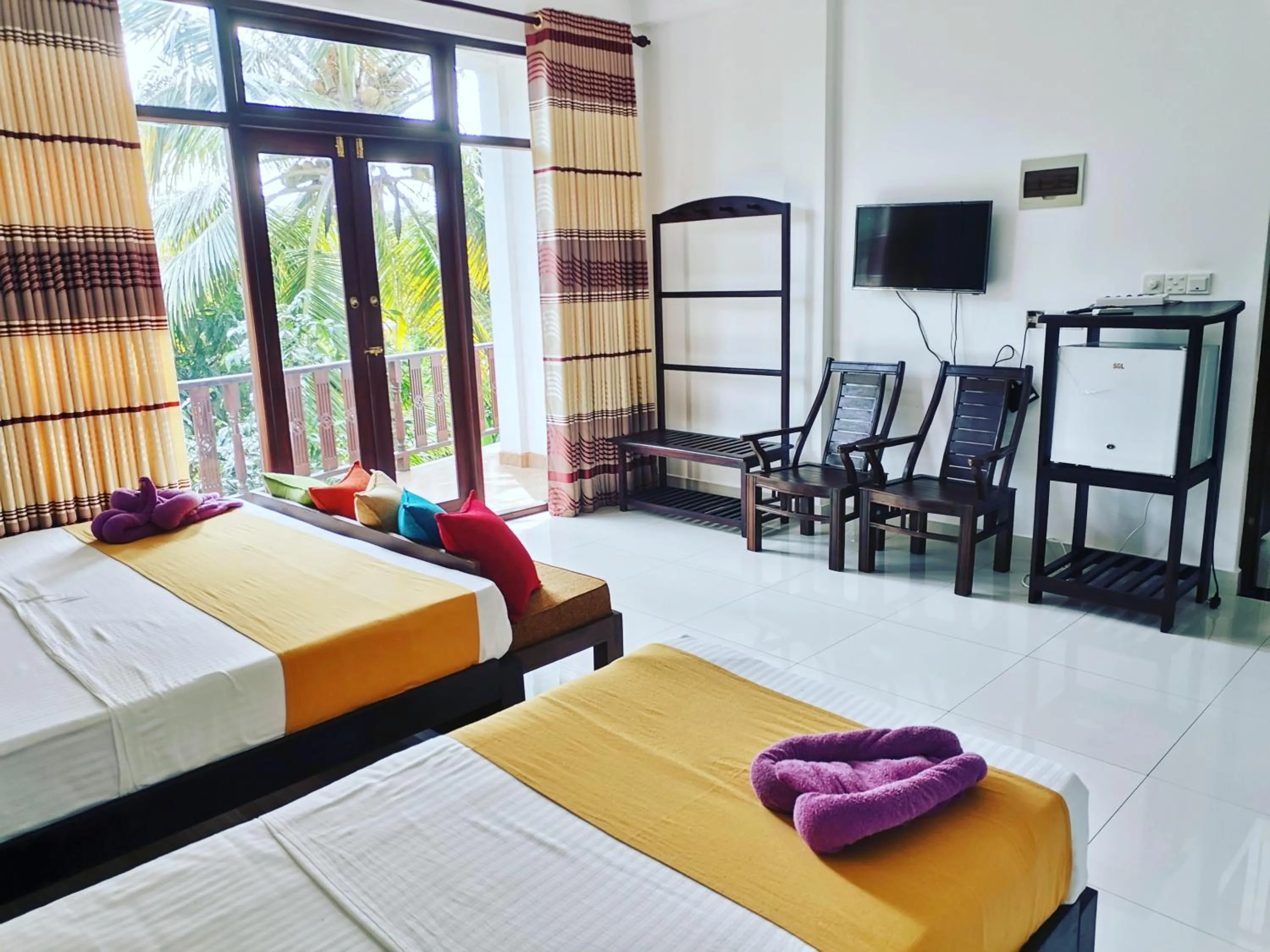 Photo of the whole room, Bed in Queen's Gate, Mirissa