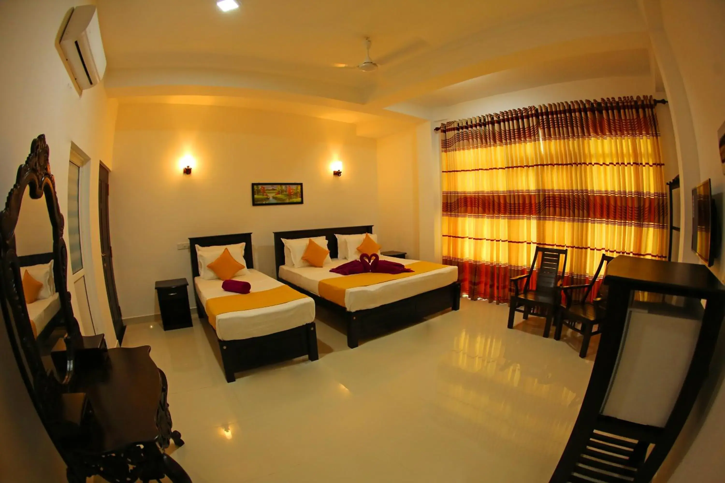 Classic Triple Room in Queen's Gate, Mirissa Classic Triple Room in Queen's Gate, Mirissa