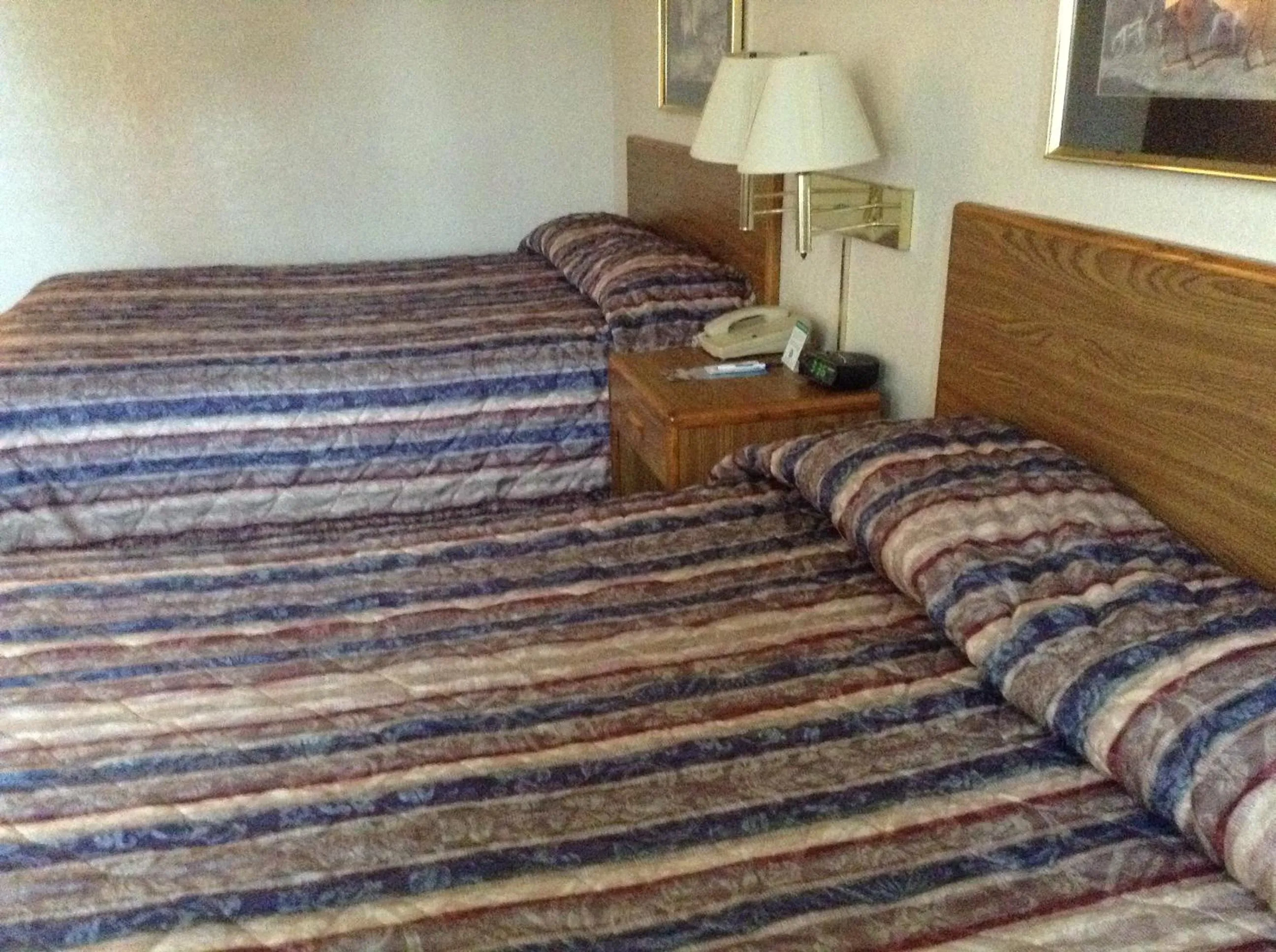 Bed in Travelodge by Wyndham Hudsonville