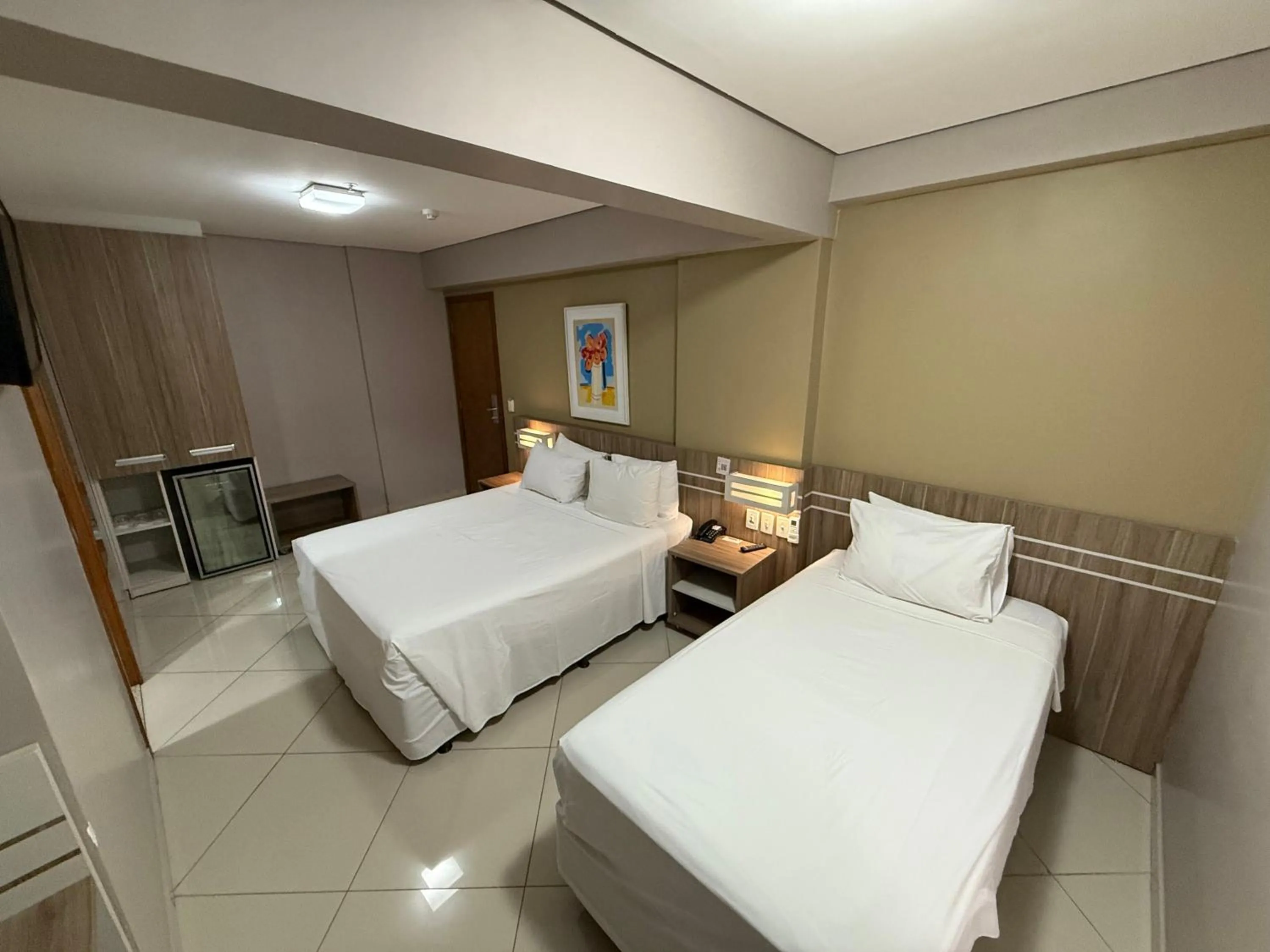 Bed in Paiaguás Palace Hotel