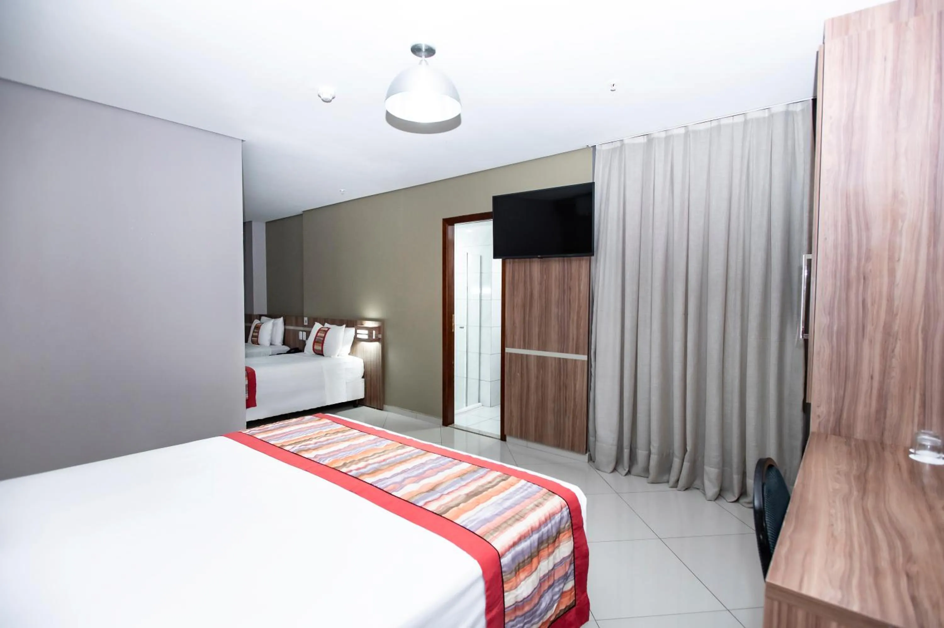 Bed in Paiaguás Palace Hotel