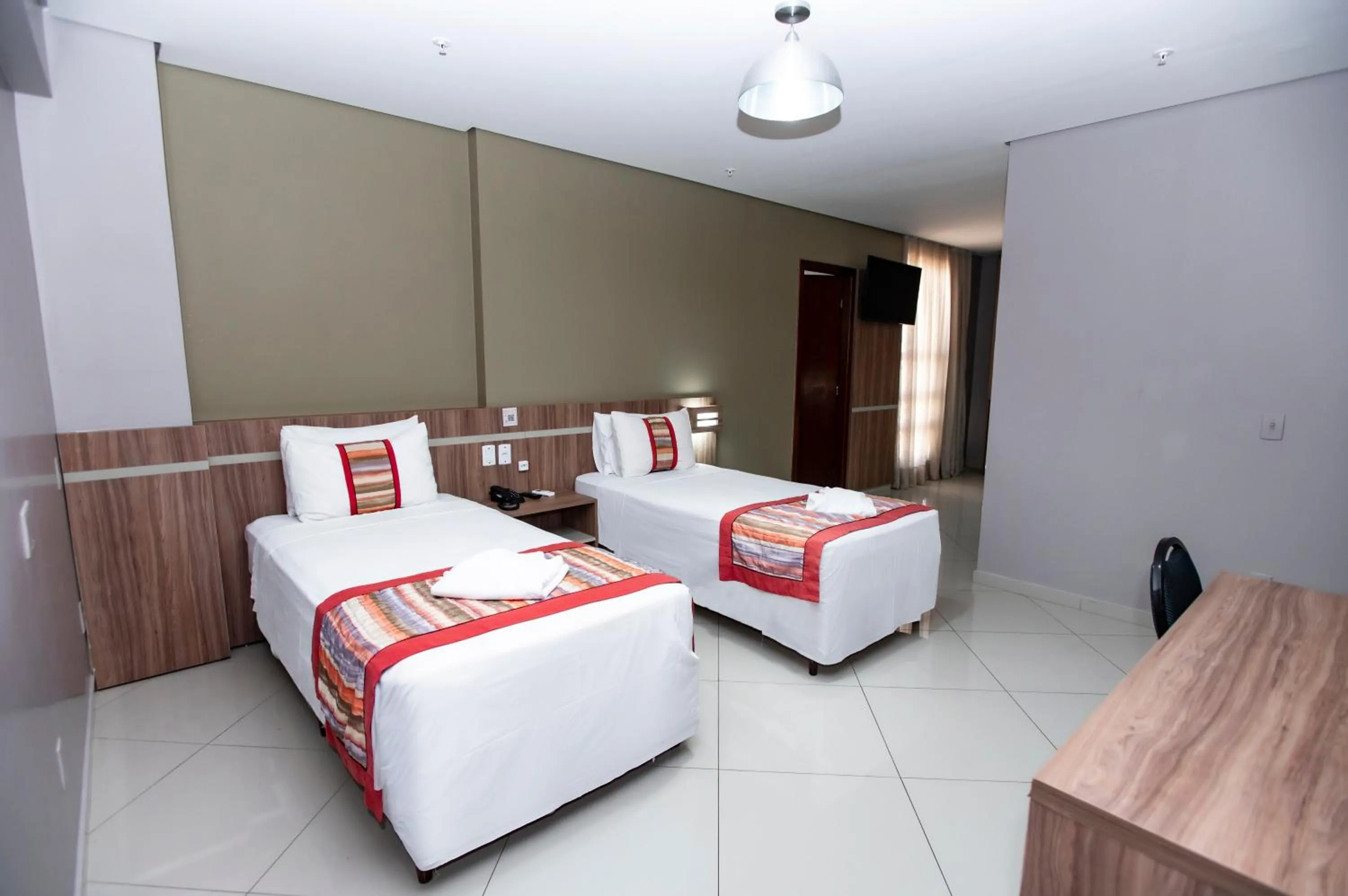 Bed in Paiaguás Palace Hotel