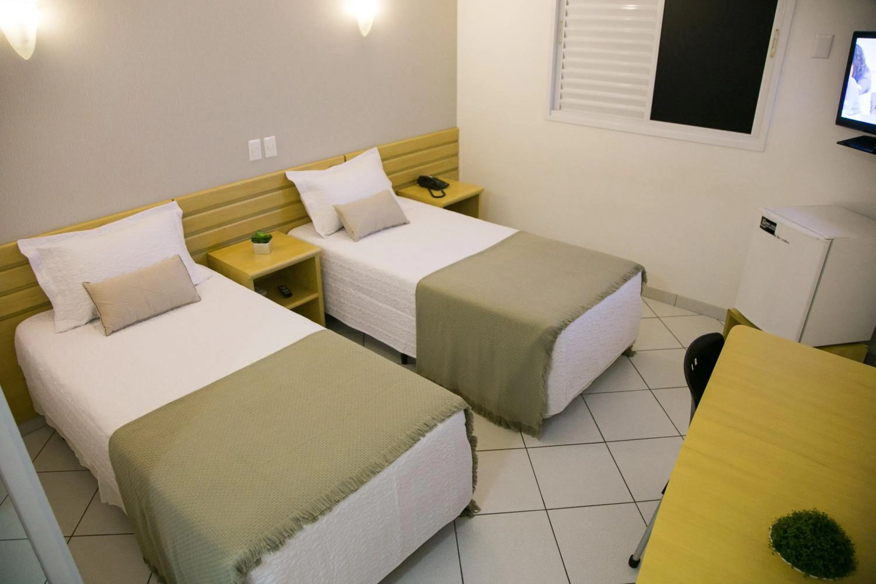 Bed in Hotel Sansaed