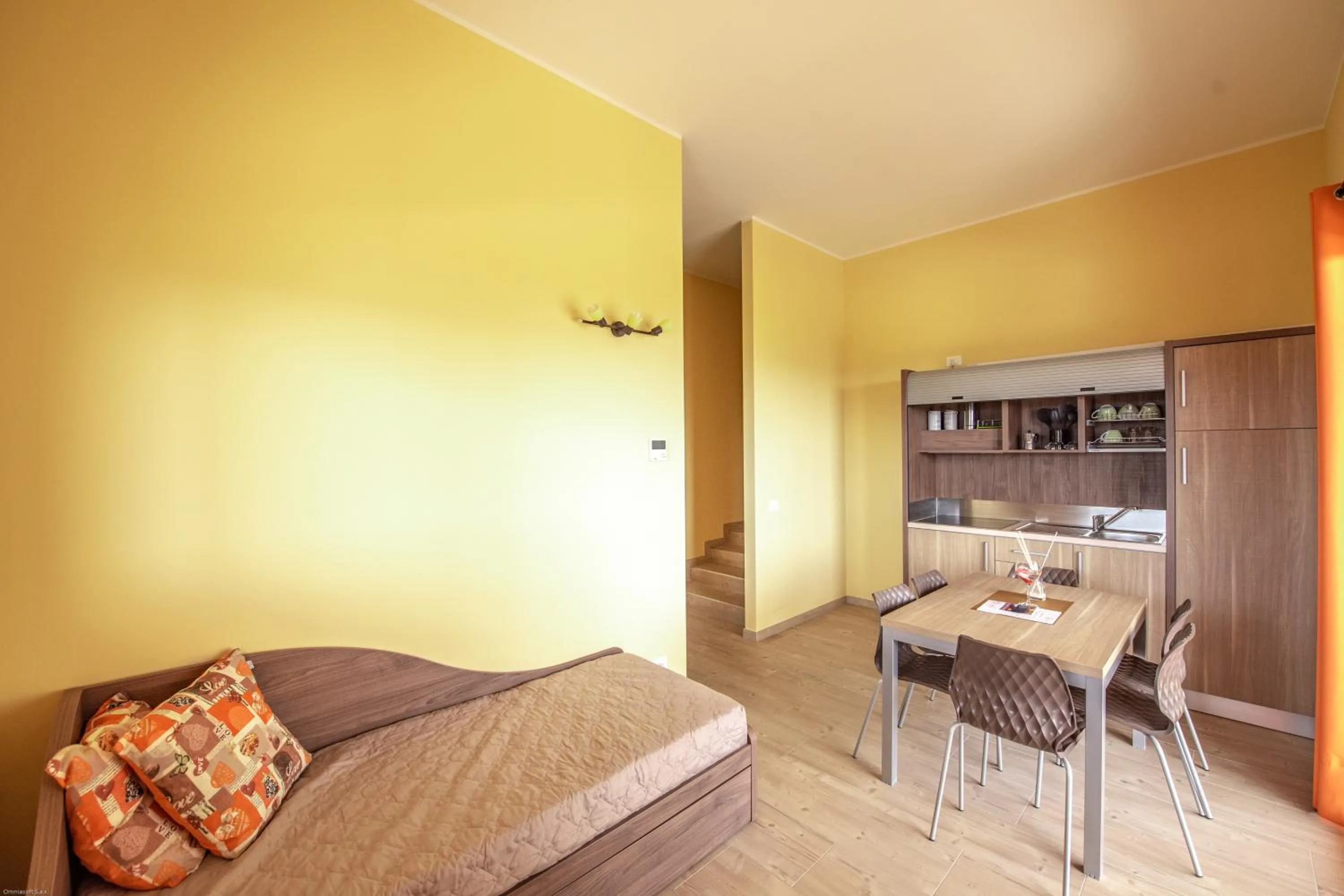 Kitchen or kitchenette, Bed in Cataleya Resort & Spa