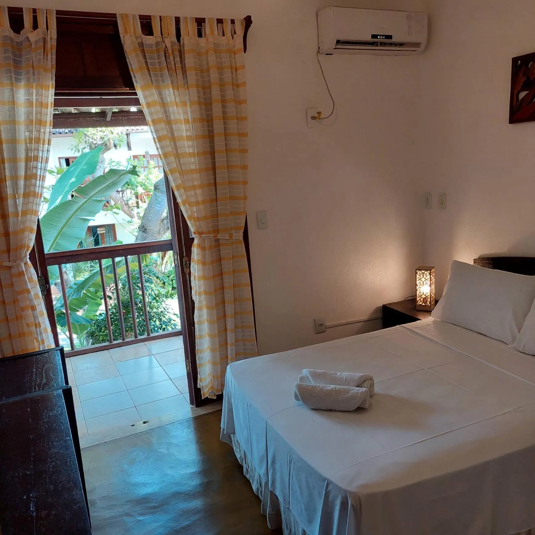 Bed in Pousada Coqueiro Verde